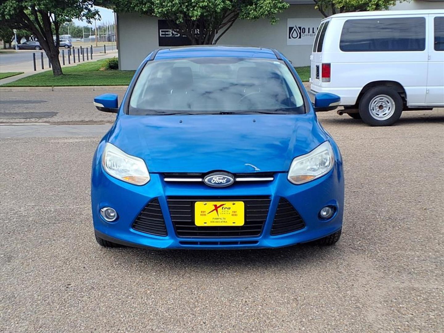 2012 Blue Candy Metallic Ford Focus SE (1FAHP3K25CL) with an 2.0L 2.0L I4 160hp 146ft. lbs. Fuel Injected engine, 6-Speed Double Clutch transmission, located at 1401 N. Hobart, Pampa, TX, 79065, (806) 665-9872, 35.549953, -100.975098 - Photo#1