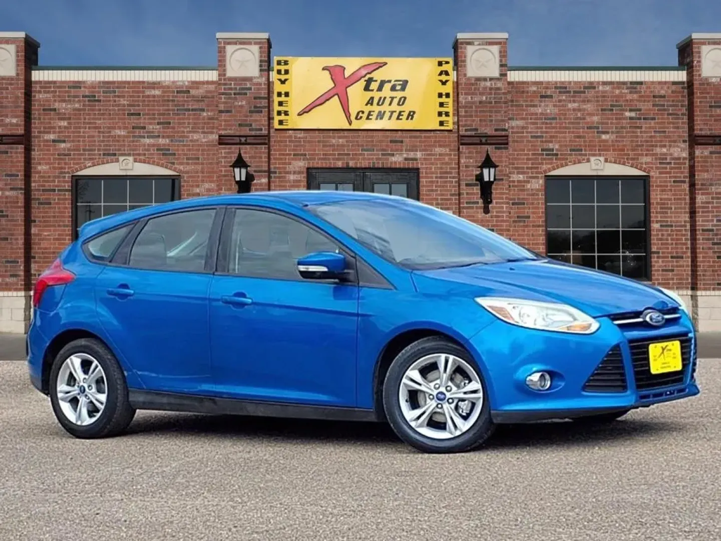 2012 Blue Candy Metallic Ford Focus SE (1FAHP3K25CL) with an Other engine, located at 1401 N. Hobart, Pampa, TX, 79065, (806) 665-9872, 35.549953, -100.975098 - **Unleash Your Adventure with the 2012 Ford Focus SE Hatchback!**<br /> <br /> Looking for a versatile vehicle that fits seamlessly into your lifestyle? Whether you're a growing family in need of extra space or a budget-conscious commuter seeking fuel efficiency, the 2012 Ford Focus SE Hatchback is - Photo#0