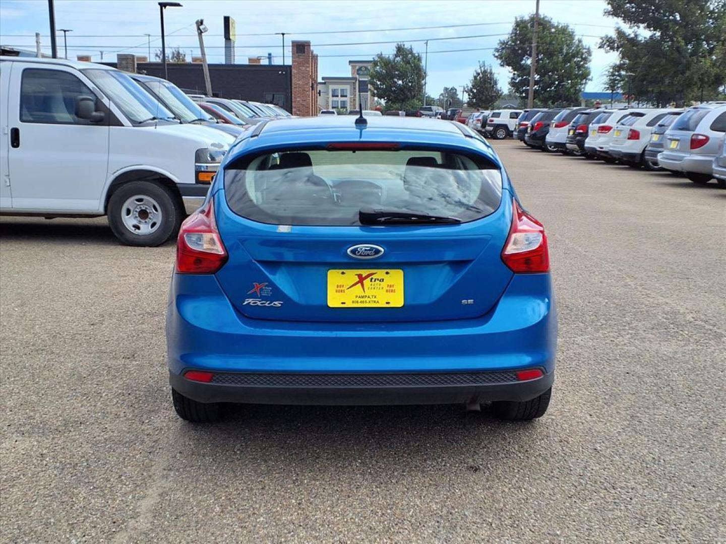 2012 Blue Candy Metallic Ford Focus SE (1FAHP3K25CL) with an 2.0L 2.0L I4 160hp 146ft. lbs. Fuel Injected engine, 6-Speed Double Clutch transmission, located at 1401 N. Hobart, Pampa, TX, 79065, (806) 665-9872, 35.549953, -100.975098 - Photo#3
