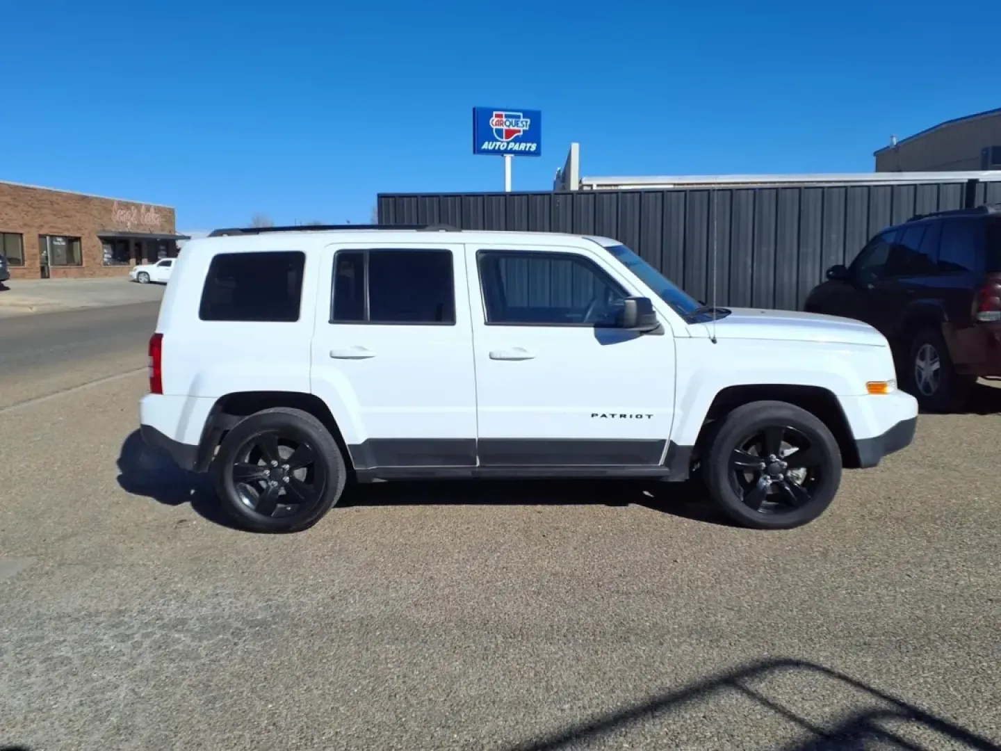 2015 Bright White Clear Coat Jeep Patriot SPORT (1C4NJPBA2FD) with an 2.0L engine, CVT transmission, located at 1401 N. Hobart, Pampa, TX, 79065, (806) 665-9872, 35.549953, -100.975098 - **Discover Adventure with the 2015 Jeep Patriot Sport SUV-Perfect for Your Next Journey!**<br /> <br /> If you're on the lookout for a versatile vehicle that seamlessly balances daily commutes and weekend escapades, the 2015 Jeep Patriot Sport is your ideal partner. With its rugged design and spacio - Photo#2