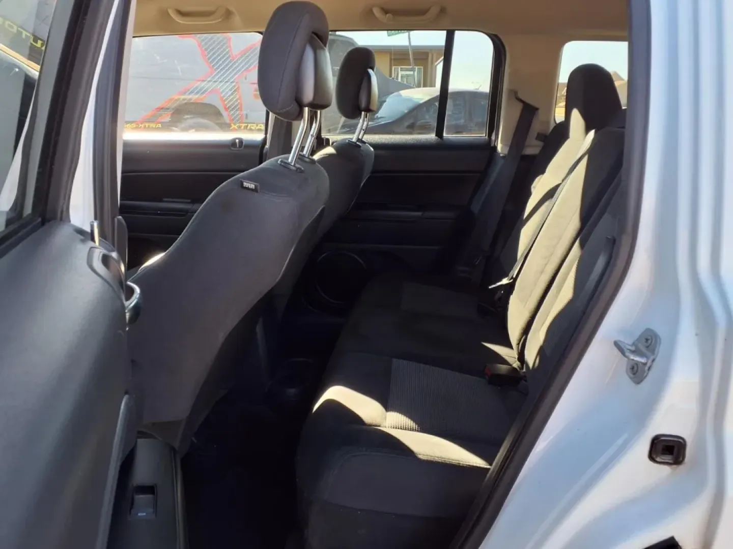 2015 Bright White Clear Coat Jeep Patriot SPORT (1C4NJPBA2FD) with an 2.0L engine, CVT transmission, located at 1401 N. Hobart, Pampa, TX, 79065, (806) 665-9872, 35.549953, -100.975098 - **Discover Adventure with the 2015 Jeep Patriot Sport SUV-Perfect for Your Next Journey!**<br /> <br /> If you're on the lookout for a versatile vehicle that seamlessly balances daily commutes and weekend escapades, the 2015 Jeep Patriot Sport is your ideal partner. With its rugged design and spacio - Photo#11