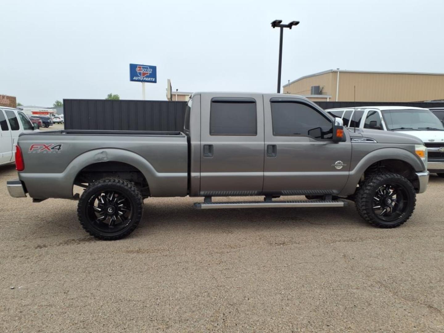 2014 Sterling Gray Metallic Uj Ford F-250 Super Duty XLT (1FT7W2BT0EE) with an 6.7L Power Stroke 6.7L Biodiesel Turbo V8 400hp 800ft. lbs. Common Rail Direct Injection engine, 6-Speed Shiftable Automatic transmission, located at 1401 N. Hobart, Pampa, TX, 79065, (806) 665-9872, 35.549953, -100.975098 - Photo#2