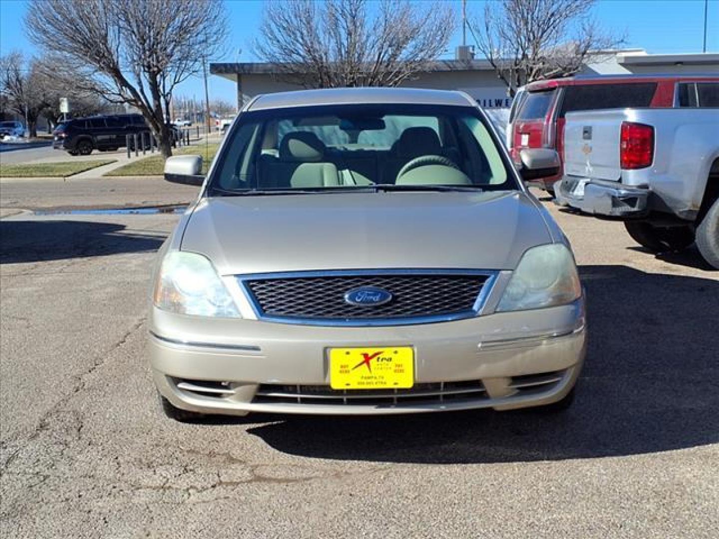 2006 Pueblo Gold Clearcoat Metallic G3 Ford Five Hundred SE (1FAFP23166G) with an 3.0L 3.0L V6 203hp 207ft. lbs. Fuel Injected engine, CVT transmission, located at 1401 N. Hobart, Pampa, TX, 79065, (806) 665-9872, 35.549953, -100.975098 - Photo#1