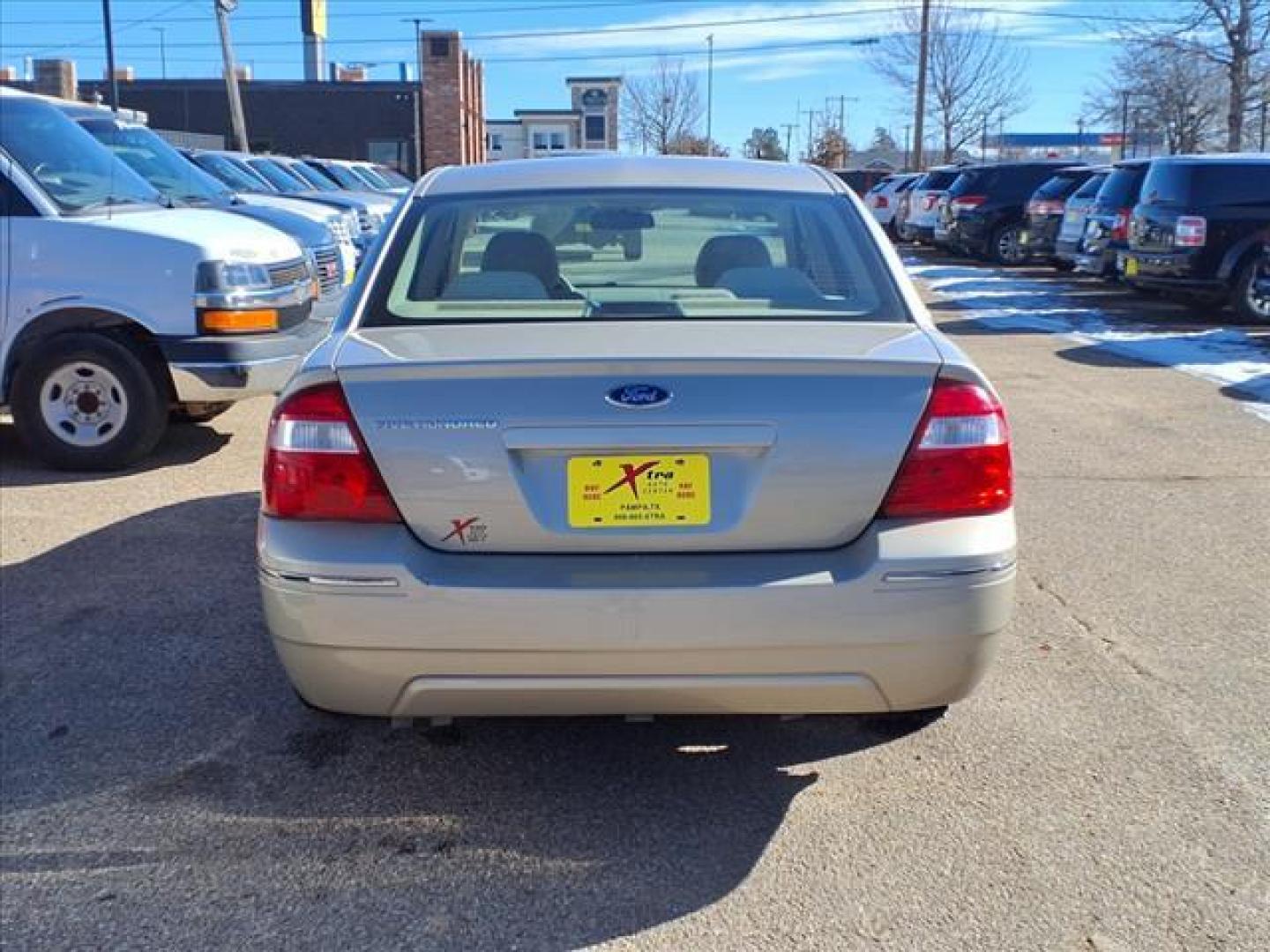 2006 Pueblo Gold Clearcoat Metallic G3 Ford Five Hundred SE (1FAFP23166G) with an 3.0L 3.0L V6 203hp 207ft. lbs. Fuel Injected engine, CVT transmission, located at 1401 N. Hobart, Pampa, TX, 79065, (806) 665-9872, 35.549953, -100.975098 - Photo#3
