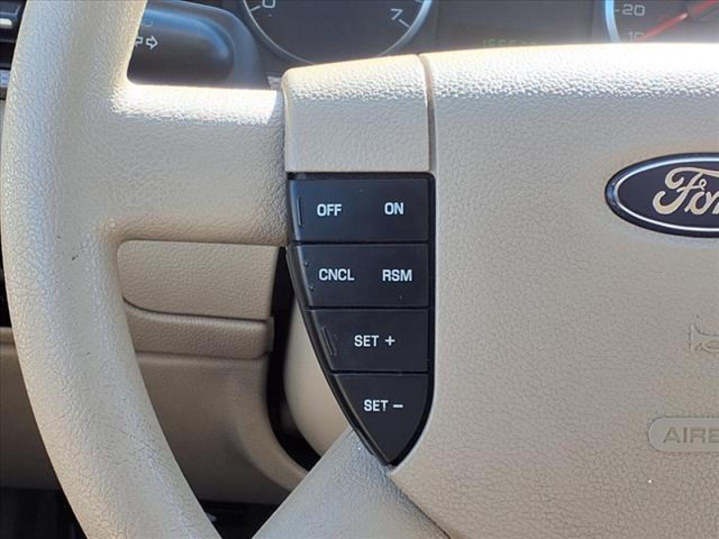 2006 Pueblo Gold Clearcoat Metallic G3 Ford Five Hundred SE (1FAFP23166G) with an 3.0L 3.0L V6 203hp 207ft. lbs. Fuel Injected engine, CVT transmission, located at 1401 N. Hobart, Pampa, TX, 79065, (806) 665-9872, 35.549953, -100.975098 - Photo#7