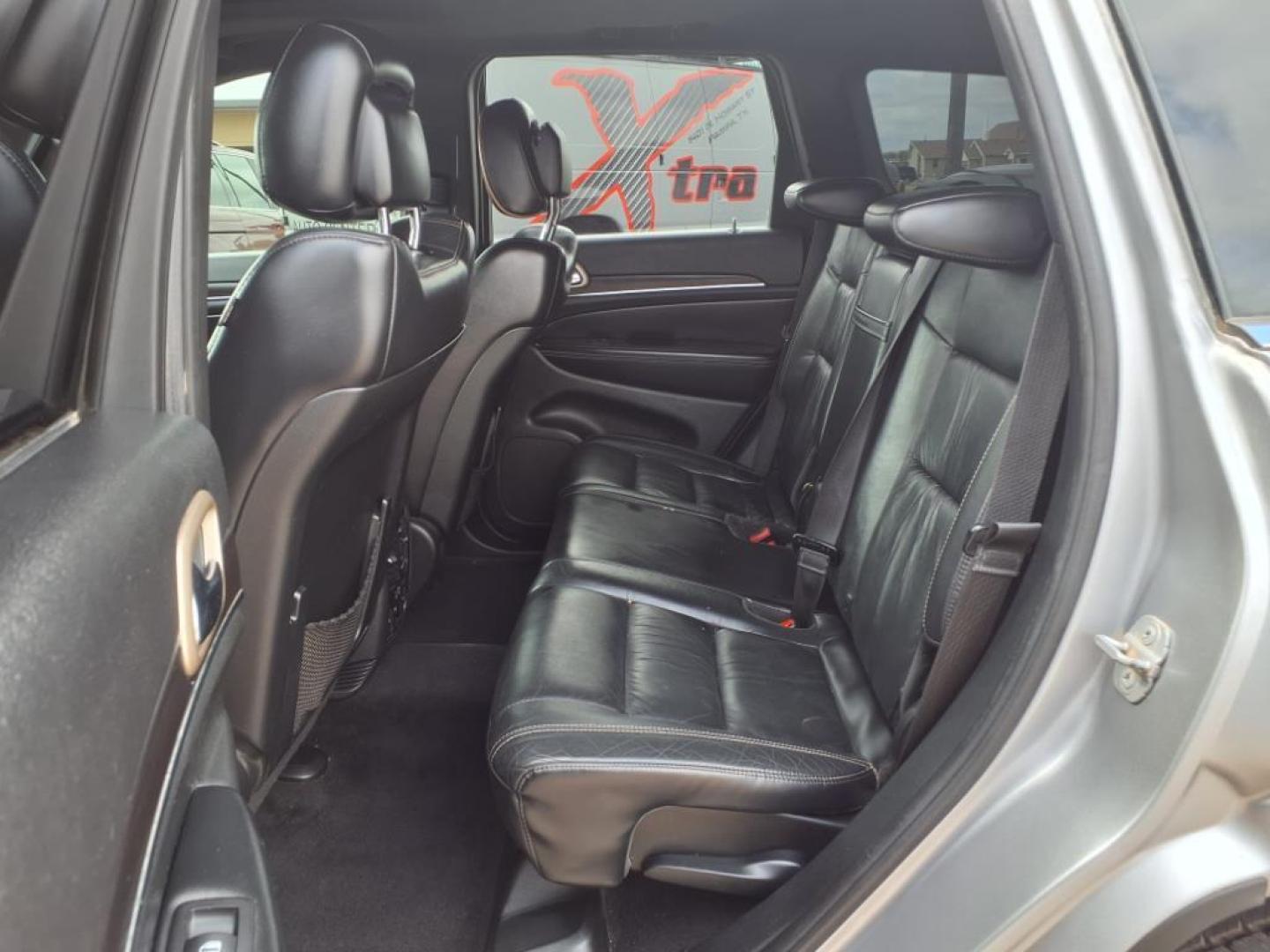2014 Billet Silver Metallic Clear Coat Jeep Grand Cherokee Limited (1C4RJEBG2EC) with an 3.6L 3.6L V6 290hp 260ft. lbs. Sequential Multiport Fuel Injection engine, 8-Speed Shiftable Automatic transmission, located at 1401 N. Hobart, Pampa, TX, 79065, (806) 665-9872, 35.549953, -100.975098 - Photo#13
