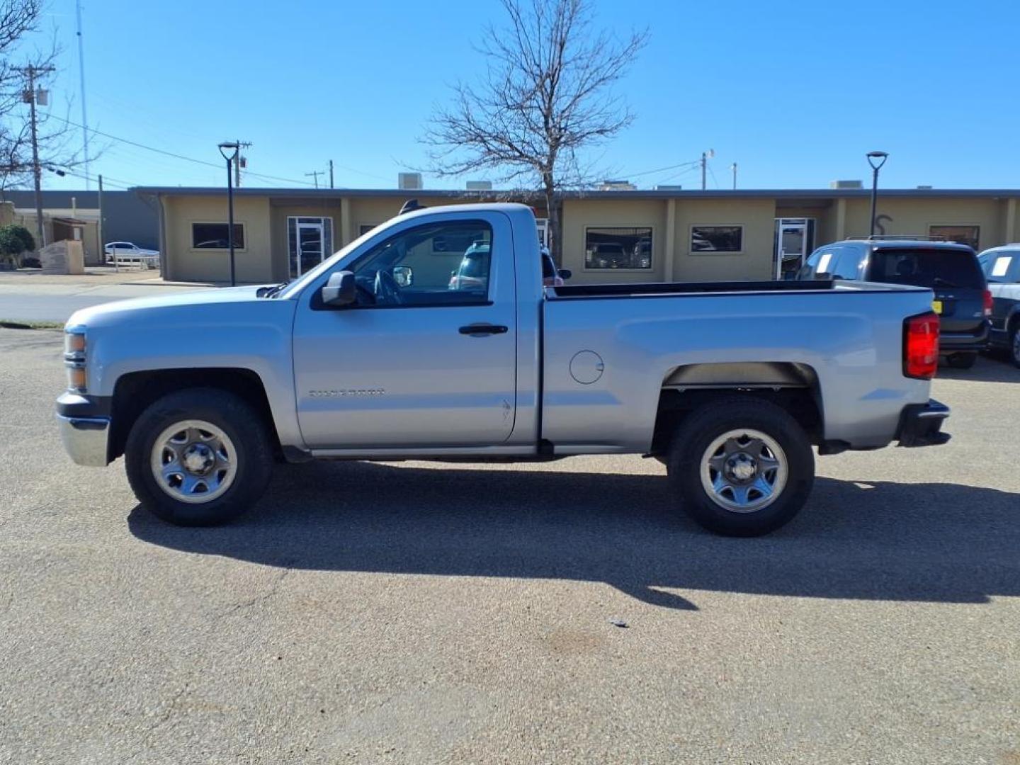 2015 Silver Ice Metallic Gan Chevrolet Silverado 1500 LS (1GCNCPEH8FZ) with an 4.3L EcoTec3 4.3L Flex Fuel V6 285hp 305ft. lbs. Direct Injection engine, 6-Speed Automatic w/Overdrive transmission, located at 1401 N. Hobart, Pampa, TX, 79065, (806) 665-9872, 35.549953, -100.975098 - Photo#4