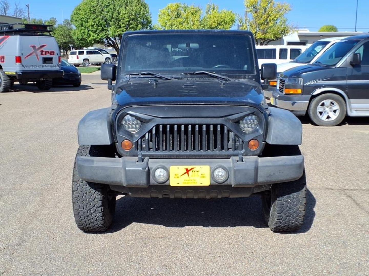 2011 Black Clear Coat Px8 Jeep Wrangler Unlimited Rubicon (1J4HA6H19BL) with an 3.8L 3.8L V6 202hp 237ft. lbs. Sequential Multiport Fuel Injection engine, 4-Speed Automatic transmission, located at 1401 N. Hobart, Pampa, TX, 79065, (806) 665-9872, 35.549953, -100.975098 - Photo#1