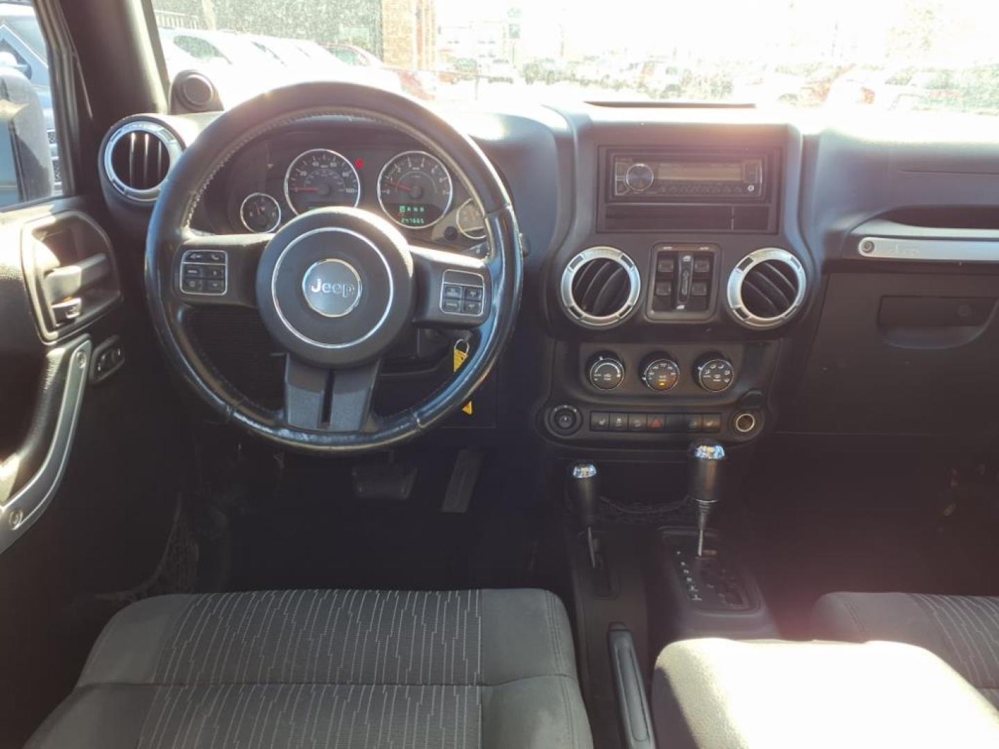 2011 Black Clear Coat Px8 Jeep Wrangler Unlimited Rubicon (1J4HA6H19BL) with an 3.8L 3.8L V6 202hp 237ft. lbs. Sequential Multiport Fuel Injection engine, 4-Speed Automatic transmission, located at 1401 N. Hobart, Pampa, TX, 79065, (806) 665-9872, 35.549953, -100.975098 - Photo#10