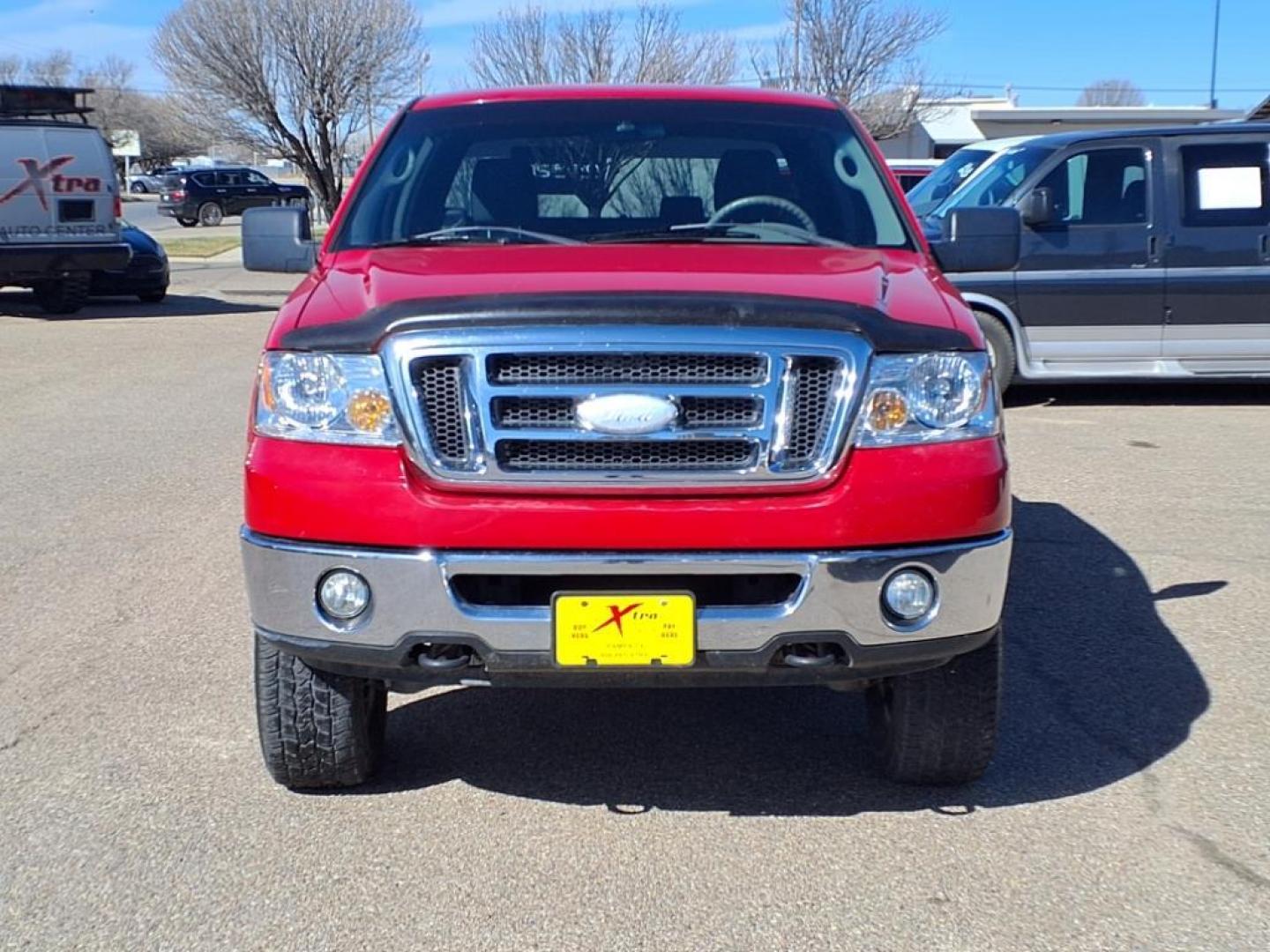 2007 Bright Red Clearcoat E4 Ford F-150 XLT (1FTRX14W37F) with an 4.6L 4.6L V8 248hp 294ft. lbs. Sequential Multiport Fuel Injection engine, 4-Speed Automatic transmission, located at 1401 N. Hobart, Pampa, TX, 79065, (806) 665-9872, 35.549953, -100.975098 - Photo#1