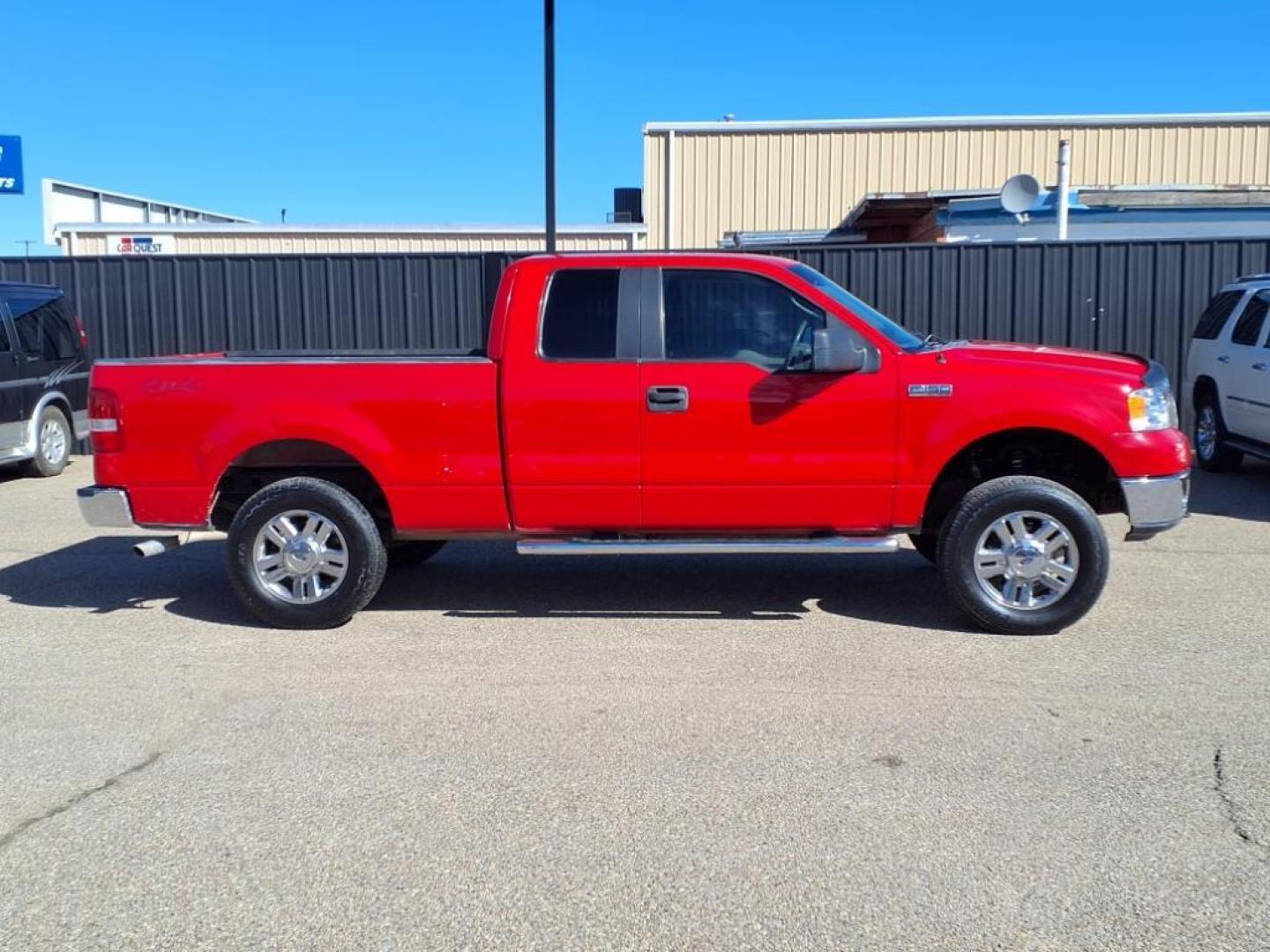2007 Bright Red Clearcoat E4 Ford F-150 XLT (1FTRX14W37F) with an 4.6L 4.6L V8 248hp 294ft. lbs. Sequential Multiport Fuel Injection engine, 4-Speed Automatic transmission, located at 1401 N. Hobart, Pampa, TX, 79065, (806) 665-9872, 35.549953, -100.975098 - Photo#2
