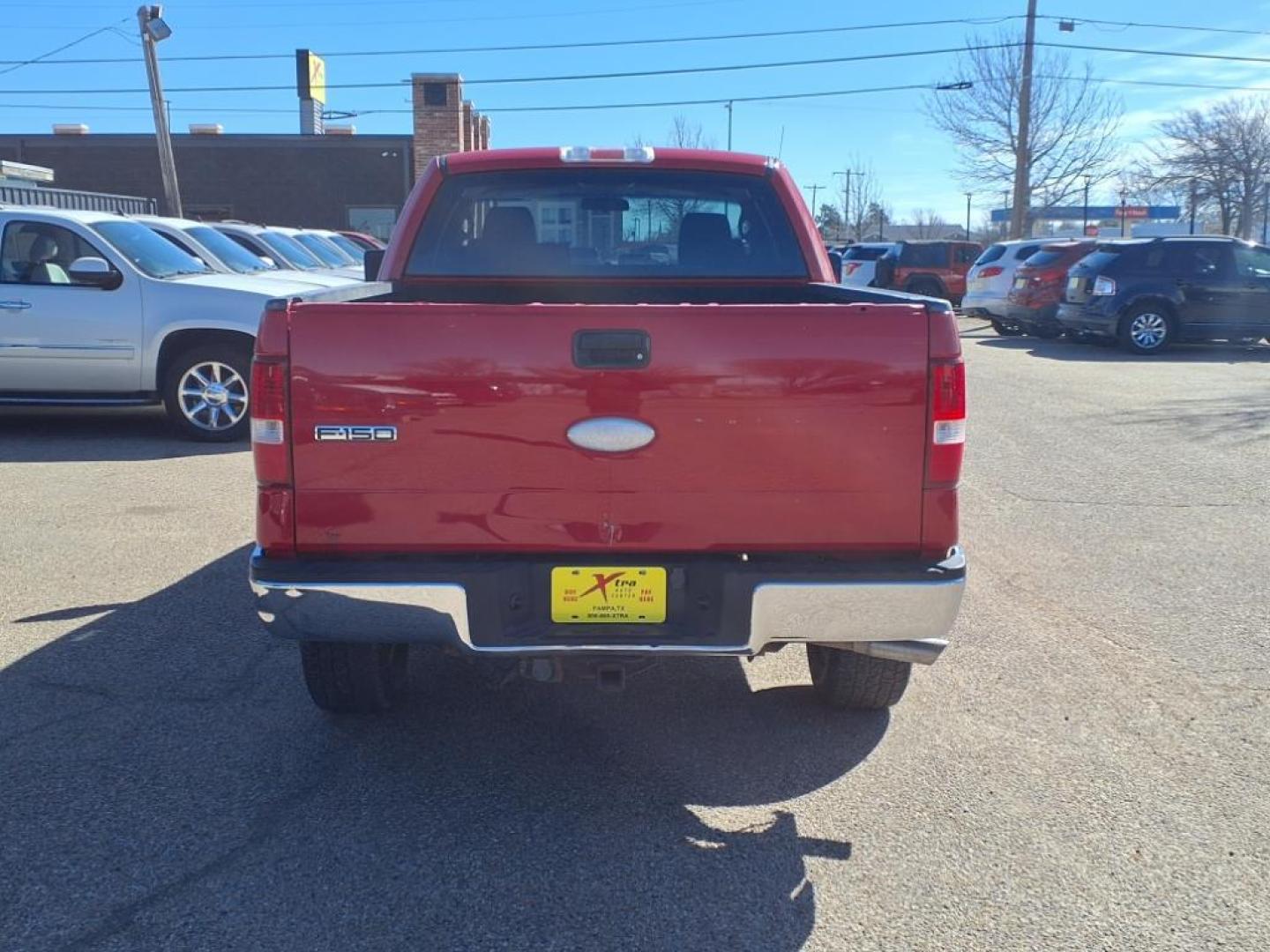 2007 Bright Red Clearcoat E4 Ford F-150 XLT (1FTRX14W37F) with an 4.6L 4.6L V8 248hp 294ft. lbs. Sequential Multiport Fuel Injection engine, 4-Speed Automatic transmission, located at 1401 N. Hobart, Pampa, TX, 79065, (806) 665-9872, 35.549953, -100.975098 - Photo#3