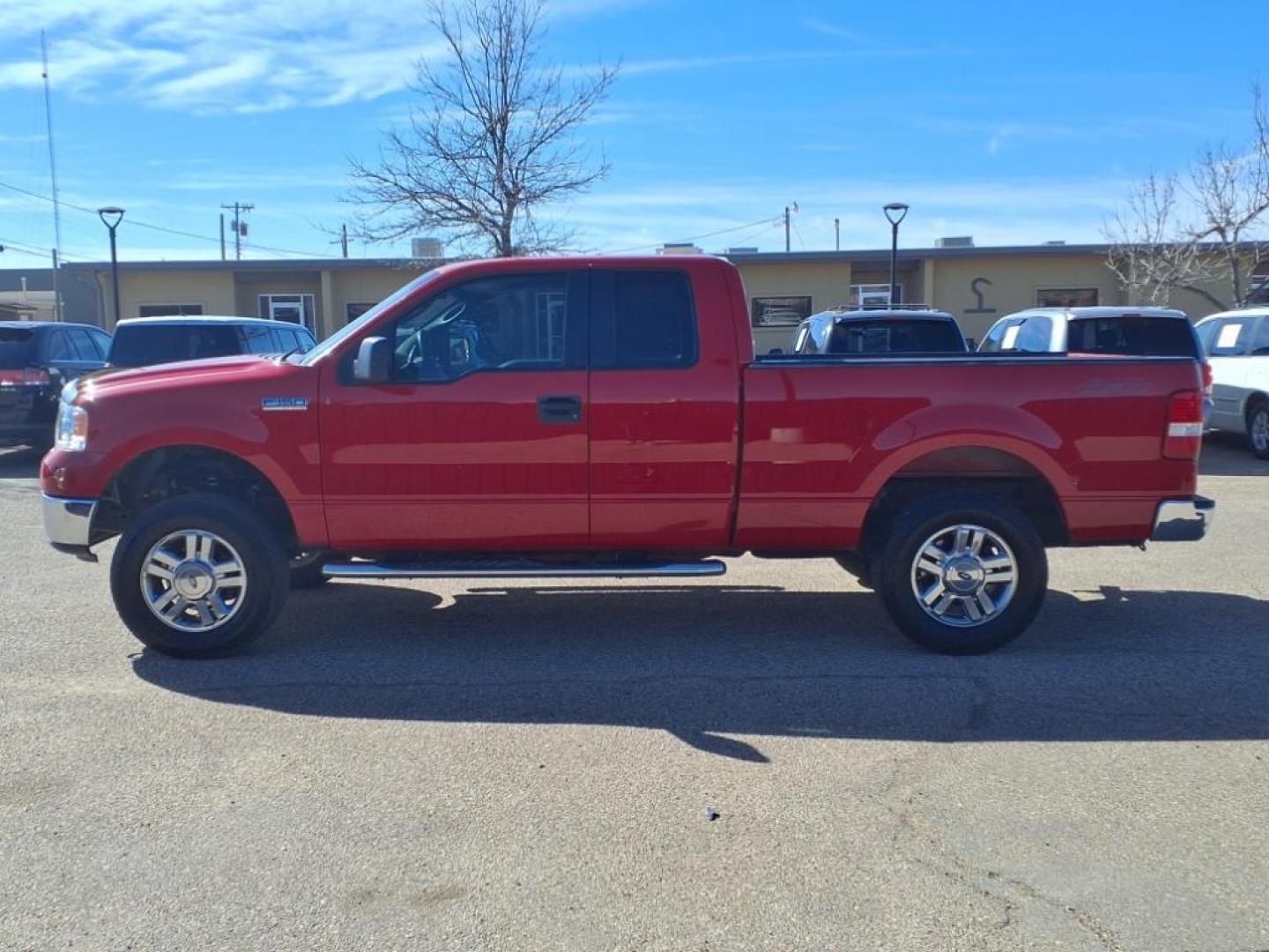 2007 Bright Red Clearcoat E4 Ford F-150 XLT (1FTRX14W37F) with an 4.6L 4.6L V8 248hp 294ft. lbs. Sequential Multiport Fuel Injection engine, 4-Speed Automatic transmission, located at 1401 N. Hobart, Pampa, TX, 79065, (806) 665-9872, 35.549953, -100.975098 - Photo#4