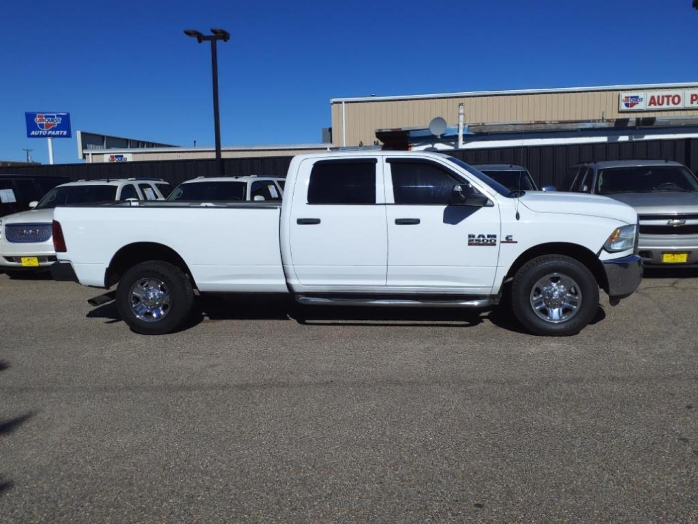 2014 Bright White Clear Coat Pw7 RAM 2500 Tradesman (3C6UR4HL5EG) with an 6.7L Cummins 6.7L Diesel Turbo I6 350hp 660ft. lbs. Common Rail Direct Injection engine, 6-Speed Shiftable Automatic transmission, located at 1401 N. Hobart, Pampa, TX, 79065, (806) 665-9872, 35.549953, -100.975098 - Photo#2