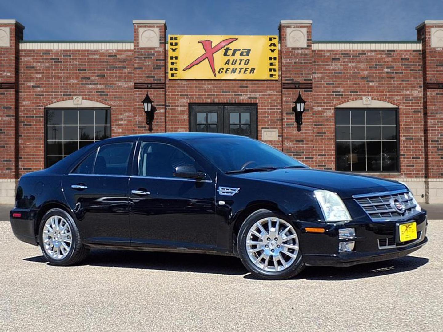 2009 Black Raven Cadillac STS V6 Luxury (1G6DK67V290) with an 3.6L 3.6L V6 302hp 272ft. lbs. Direct Injection engine, 6-Speed Shiftable Automatic transmission, located at 1401 N. Hobart, Pampa, TX, 79065, (806) 665-9872, 35.549953, -100.975098 - Photo#0