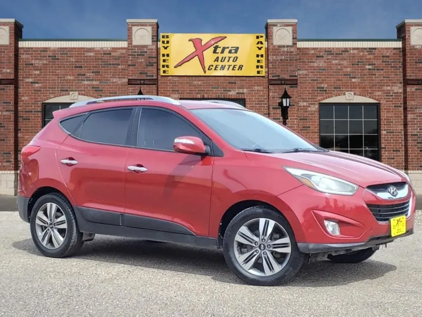 2014 Garnet Red Hyundai Tucson GLS AWD (KM8JUCAG2EU) with an Other engine, Automatic transmission, located at 1401 N. Hobart, Pampa, TX, 79065, (806) 665-9872, 35.549953, -100.975098 - Are you searching for the perfect SUV that combines style, versatility, and dependability for your everyday adventures? Look no further! The 2014 Hyundai Tucson GLS AWD is designed for those who crave a reliable vehicle for family outings, daily commutes, and weekend escapades. With its spacious int - Photo#0