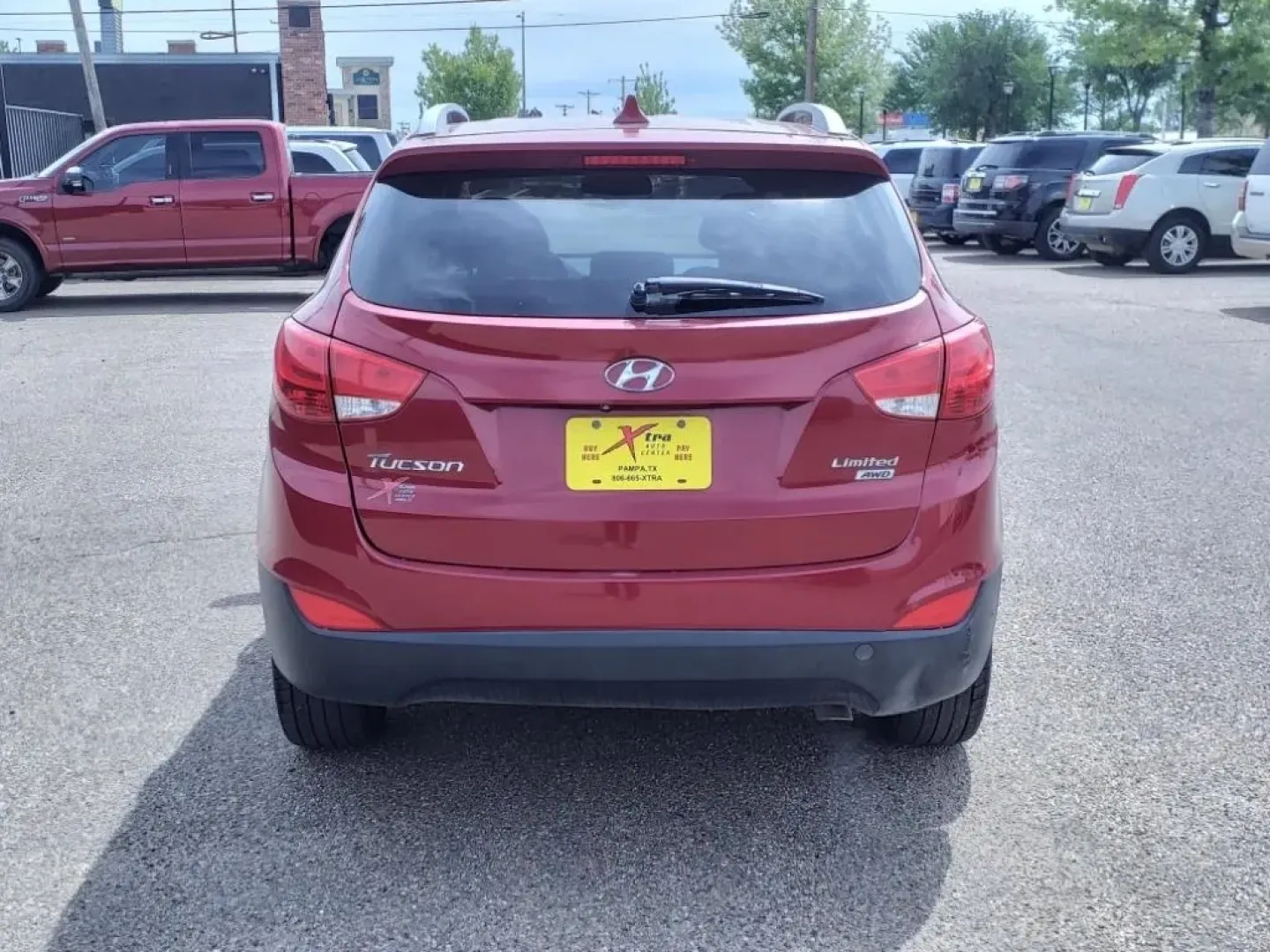 2014 Garnet Red Hyundai Tucson GLS AWD (KM8JUCAG2EU) with an Other engine, Automatic transmission, located at 1401 N. Hobart, Pampa, TX, 79065, (806) 665-9872, 35.549953, -100.975098 - Are you searching for the perfect SUV that combines style, versatility, and dependability for your everyday adventures? Look no further! The 2014 Hyundai Tucson GLS AWD is designed for those who crave a reliable vehicle for family outings, daily commutes, and weekend escapades. With its spacious int - Photo#3