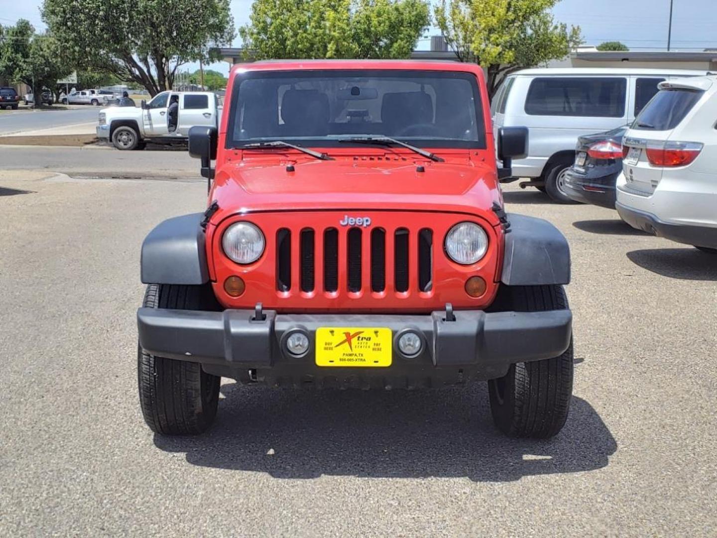 2011 Flame Red Clear Coat Jeep Wrangler Sport (1J4AA2D10BL) with an 3.8L 3.8L V6 202hp 237ft. lbs. Sequential Multiport Fuel Injection engine, 6-Speed Manual transmission, located at 1401 N. Hobart, Pampa, TX, 79065, (806) 665-9872, 35.549953, -100.975098 - Photo#1