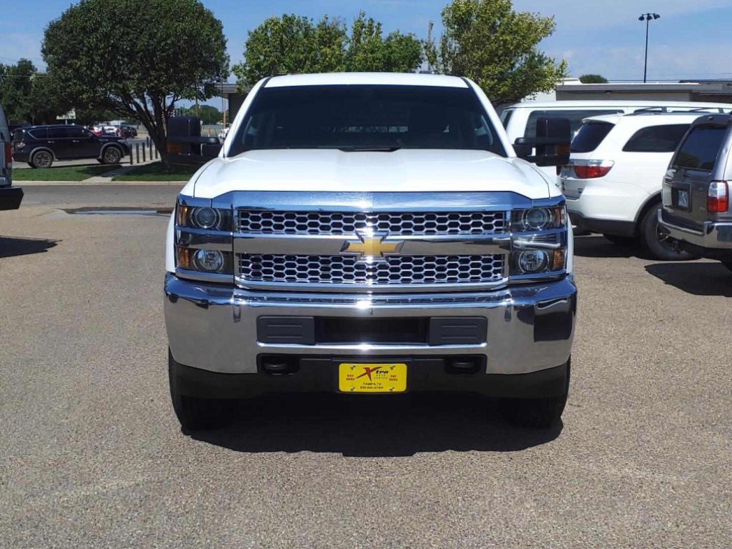 2019 Summit White Chevrolet Silverado 2500HD Work Truck (1GC1KREGXKF) with an 6.0L Vortec 6.0L Flex Fuel V8 360hp 380ft. lbs. Sequential Electronic Fuel Injection engine, 6-Speed Shiftable Automatic transmission, located at 1401 N. Hobart, Pampa, TX, 79065, (806) 665-9872, 35.549953, -100.975098 - Photo#1