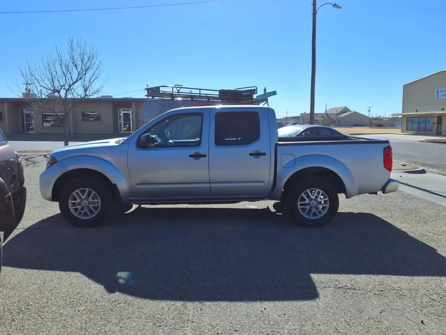 2015 Brilliant Silver Nissan Frontier S (1N6AD0EV8FN) with an 4.0L engine, Automatic transmission, located at 1401 N. Hobart, Pampa, TX, 79065, (806) 665-9872, 35.549953, -100.975098 - **Unleash Your Adventurous Spirit with the 2015 Nissan Frontier - Perfect for Every Journey!**<br /> <br /> Are you seeking a reliable and rugged pickup truck that can handle both daily commutes and weekend getaways? Look no further than the 2015 Nissan Frontier, proudly offered by Xtra Auto Center - Photo#4