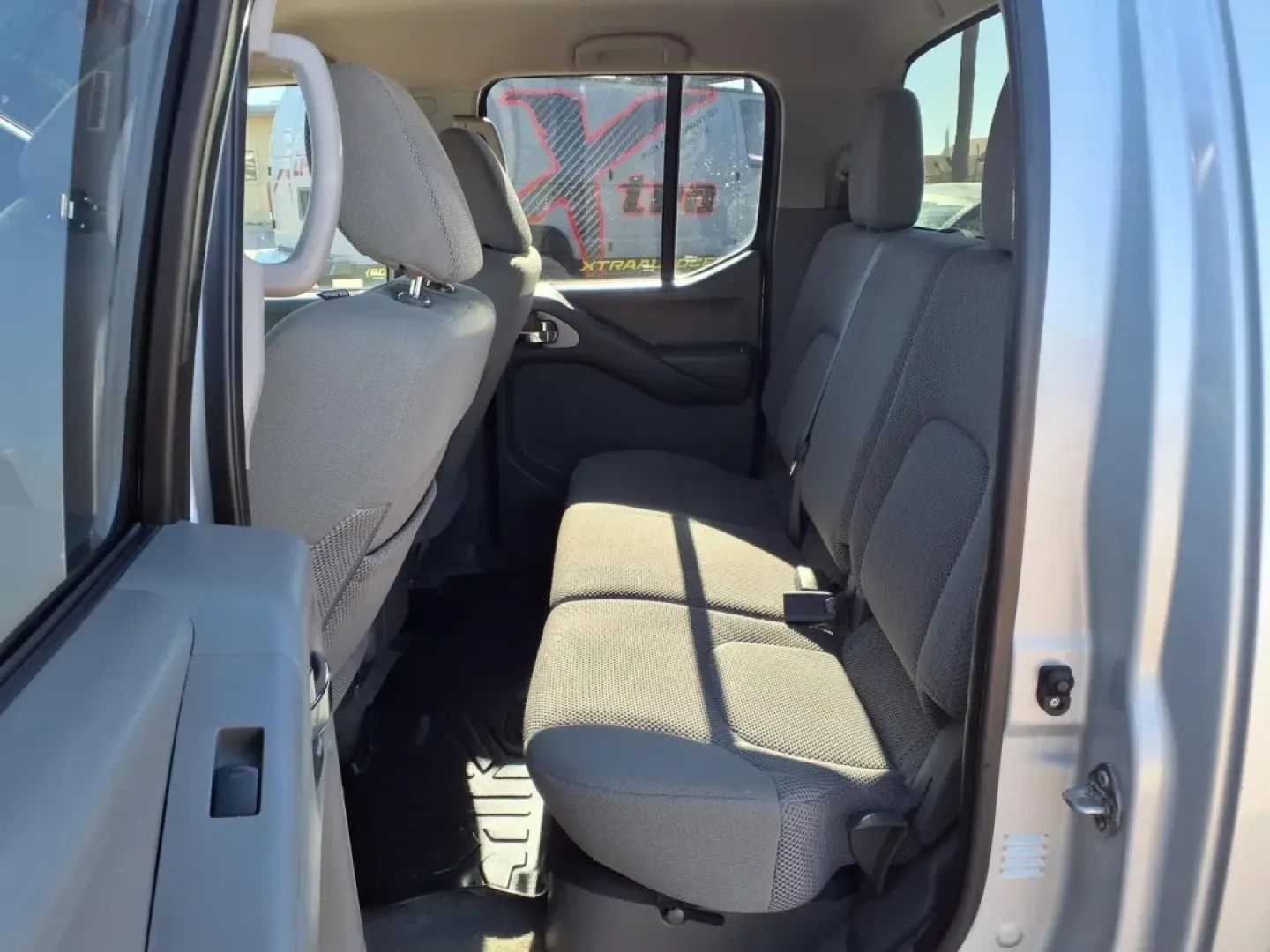 2015 Brilliant Silver Nissan Frontier S (1N6AD0EV8FN) with an 4.0L engine, Automatic transmission, located at 1401 N. Hobart, Pampa, TX, 79065, (806) 665-9872, 35.549953, -100.975098 - **Unleash Your Adventurous Spirit with the 2015 Nissan Frontier - Perfect for Every Journey!**<br /> <br /> Are you seeking a reliable and rugged pickup truck that can handle both daily commutes and weekend getaways? Look no further than the 2015 Nissan Frontier, proudly offered by Xtra Auto Center - Photo#13