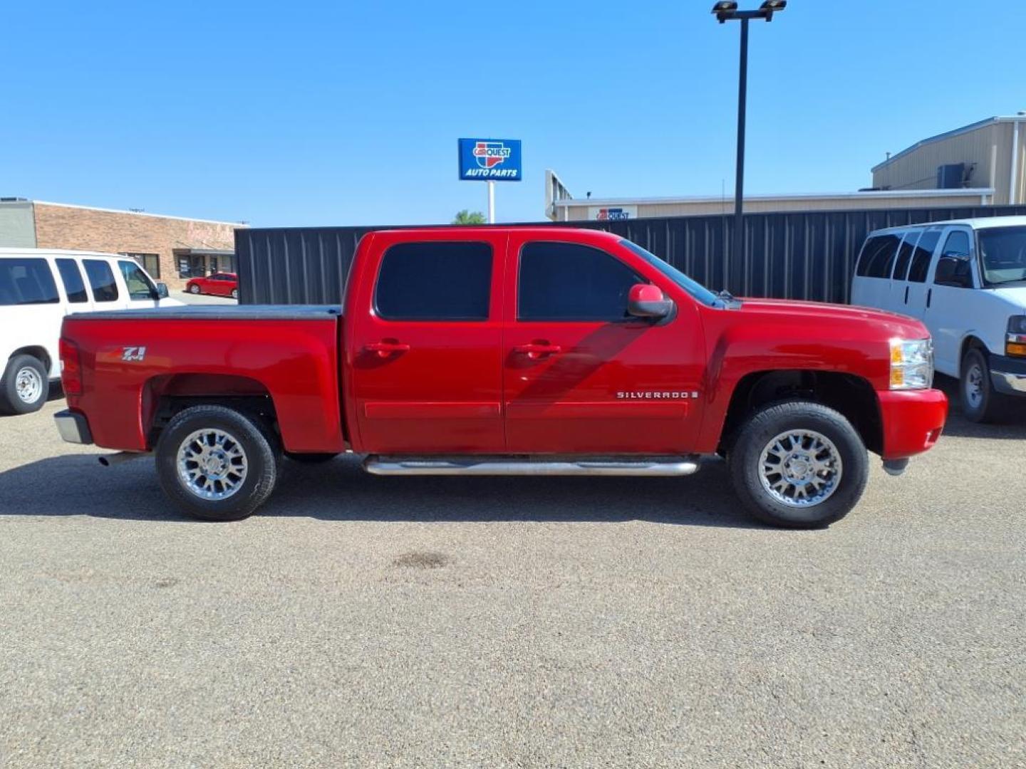 2008 Victory Red Chevrolet Silverado 1500 LTZ (2GCEK13J381) with an 5.3L Vortec Iron Block 5.3L V8 315hp 338ft. lbs. Fuel Injected engine, 4-Speed Automatic transmission, located at 1401 N. Hobart, Pampa, TX, 79065, (806) 665-9872, 35.549953, -100.975098 - Photo#2