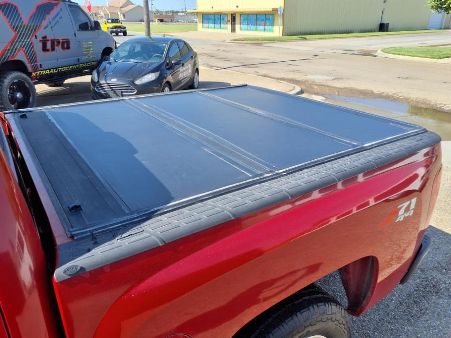 2008 Victory Red Chevrolet Silverado 1500 LTZ (2GCEK13J381) with an 5.3L Vortec Iron Block 5.3L V8 315hp 338ft. lbs. Fuel Injected engine, 4-Speed Automatic transmission, located at 1401 N. Hobart, Pampa, TX, 79065, (806) 665-9872, 35.549953, -100.975098 - Photo#5