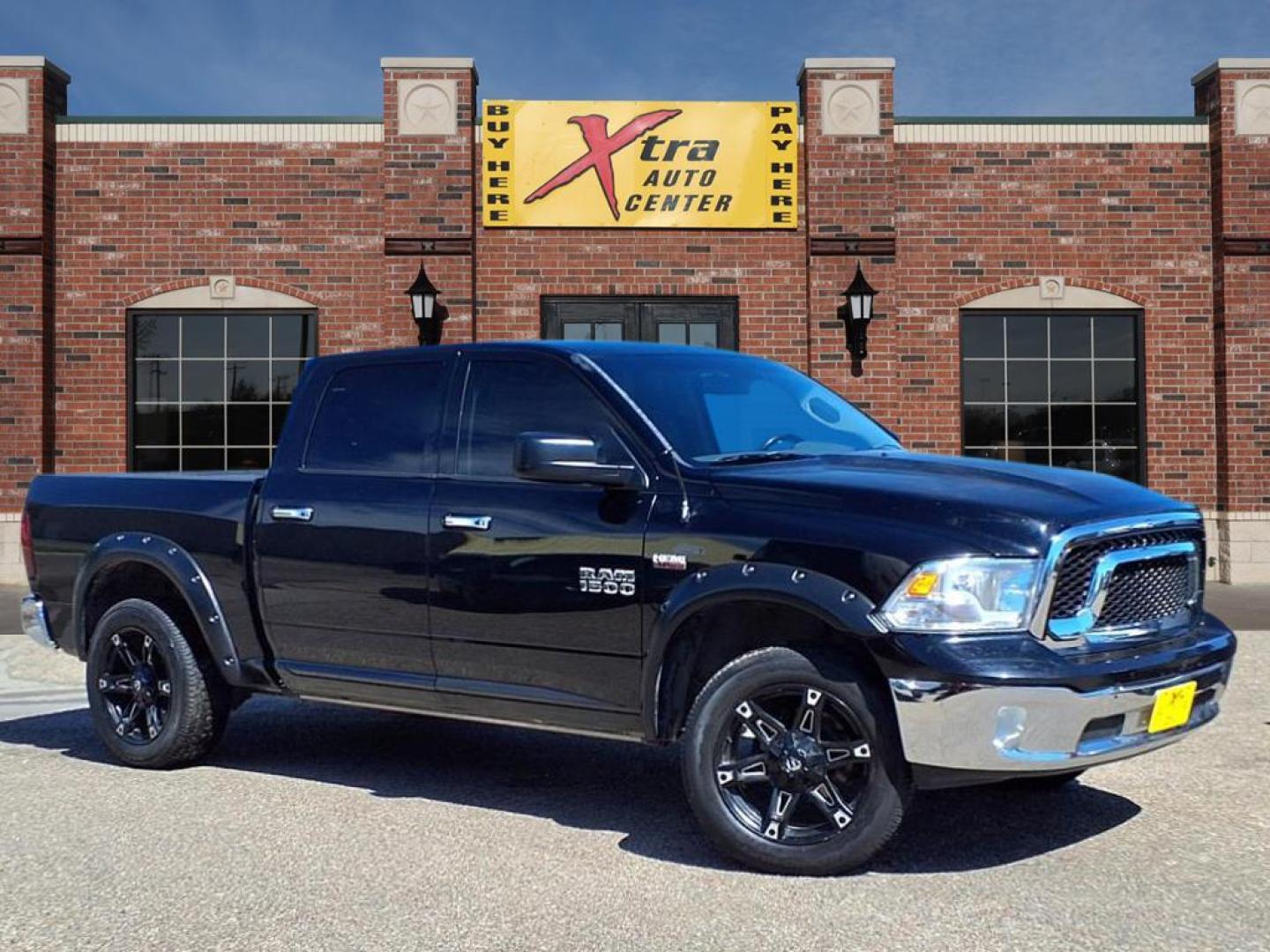2014 Black Clear Coat RAM 1500 Big Horn (1C6RR7LT1ES) with an 5.7L HEMI 5.7L V8 395hp 407ft. lbs. Sequential Multiport Fuel Injection engine, 8-Speed Shiftable Automatic transmission, located at 1401 N. Hobart, Pampa, TX, 79065, (806) 665-9872, 35.549953, -100.975098 - Photo#0