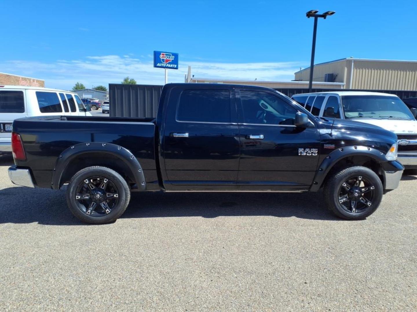 2014 Black Clear Coat RAM 1500 Big Horn (1C6RR7LT1ES) with an 5.7L HEMI 5.7L V8 395hp 407ft. lbs. Sequential Multiport Fuel Injection engine, 8-Speed Shiftable Automatic transmission, located at 1401 N. Hobart, Pampa, TX, 79065, (806) 665-9872, 35.549953, -100.975098 - Photo#2