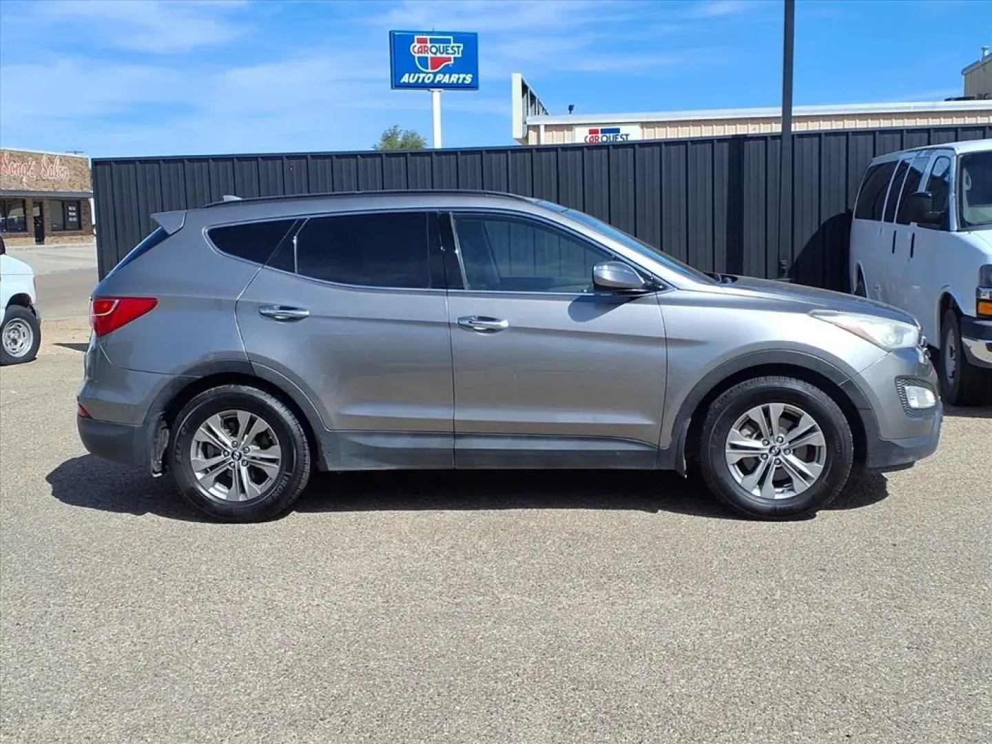 2014 Mineral Gray Hyundai Santa Fe (5XYZU3LB7EG) with an 2.4L engine, Automatic transmission, located at 1401 N. Hobart, Pampa, TX, 79065, (806) 665-9872, 35.549953, -100.975098 - ### Discover Your Perfect Family SUV: 2014 Hyundai Santa Fe Sport at Xtra Auto Center in Pampa, TX!<br /> <br /> Are you on the hunt for a reliable family vehicle that's perfect for road trips, daily commutes, and weekend adventures? Look no further than this 2014 Hyundai Santa Fe Sport, available n - Photo#2