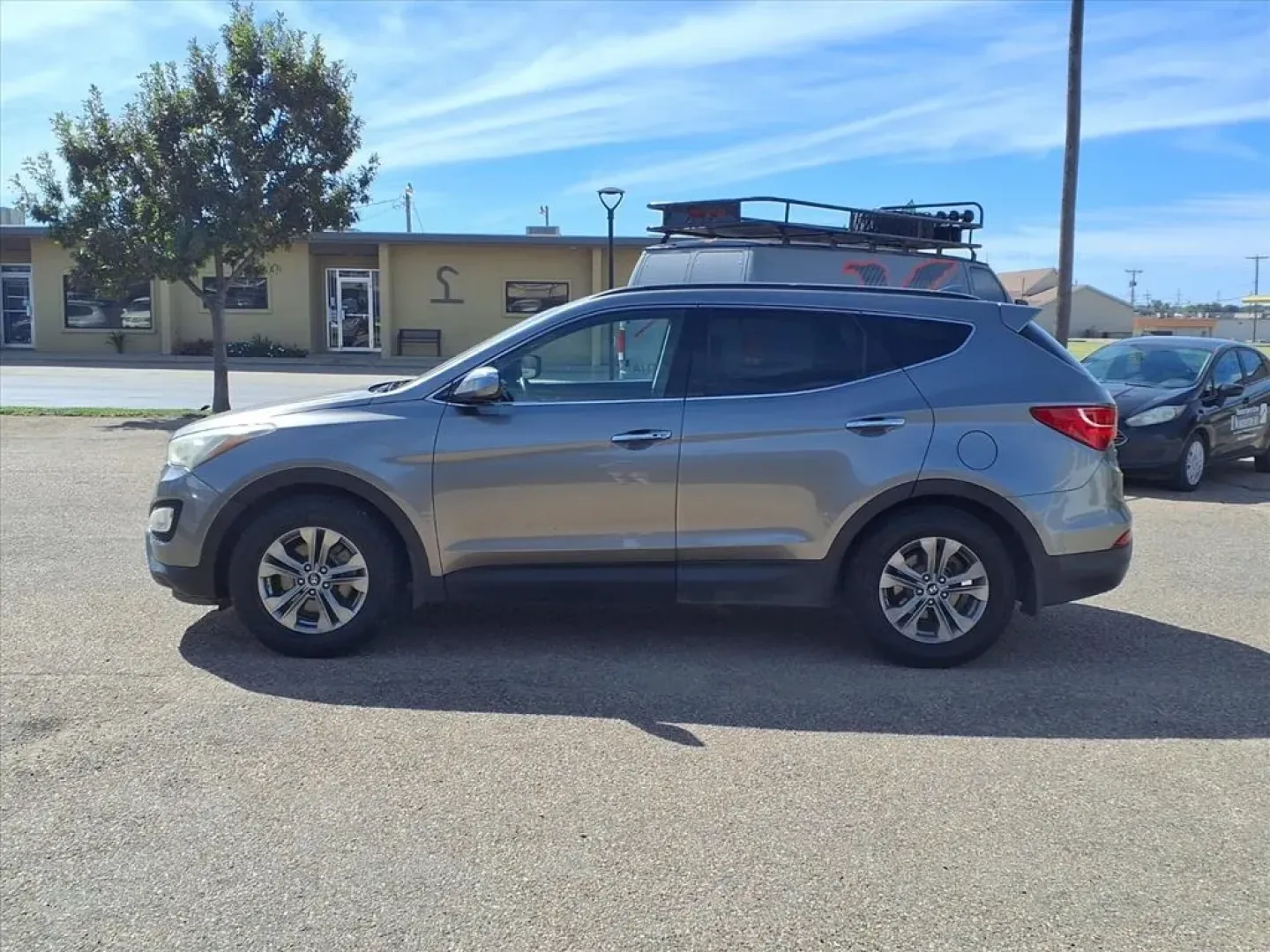 2014 Mineral Gray Hyundai Santa Fe (5XYZU3LB7EG) with an 2.4L engine, Automatic transmission, located at 1401 N. Hobart, Pampa, TX, 79065, (806) 665-9872, 35.549953, -100.975098 - ### Discover Your Perfect Family SUV: 2014 Hyundai Santa Fe Sport at Xtra Auto Center in Pampa, TX!<br /> <br /> Are you on the hunt for a reliable family vehicle that's perfect for road trips, daily commutes, and weekend adventures? Look no further than this 2014 Hyundai Santa Fe Sport, available n - Photo#4