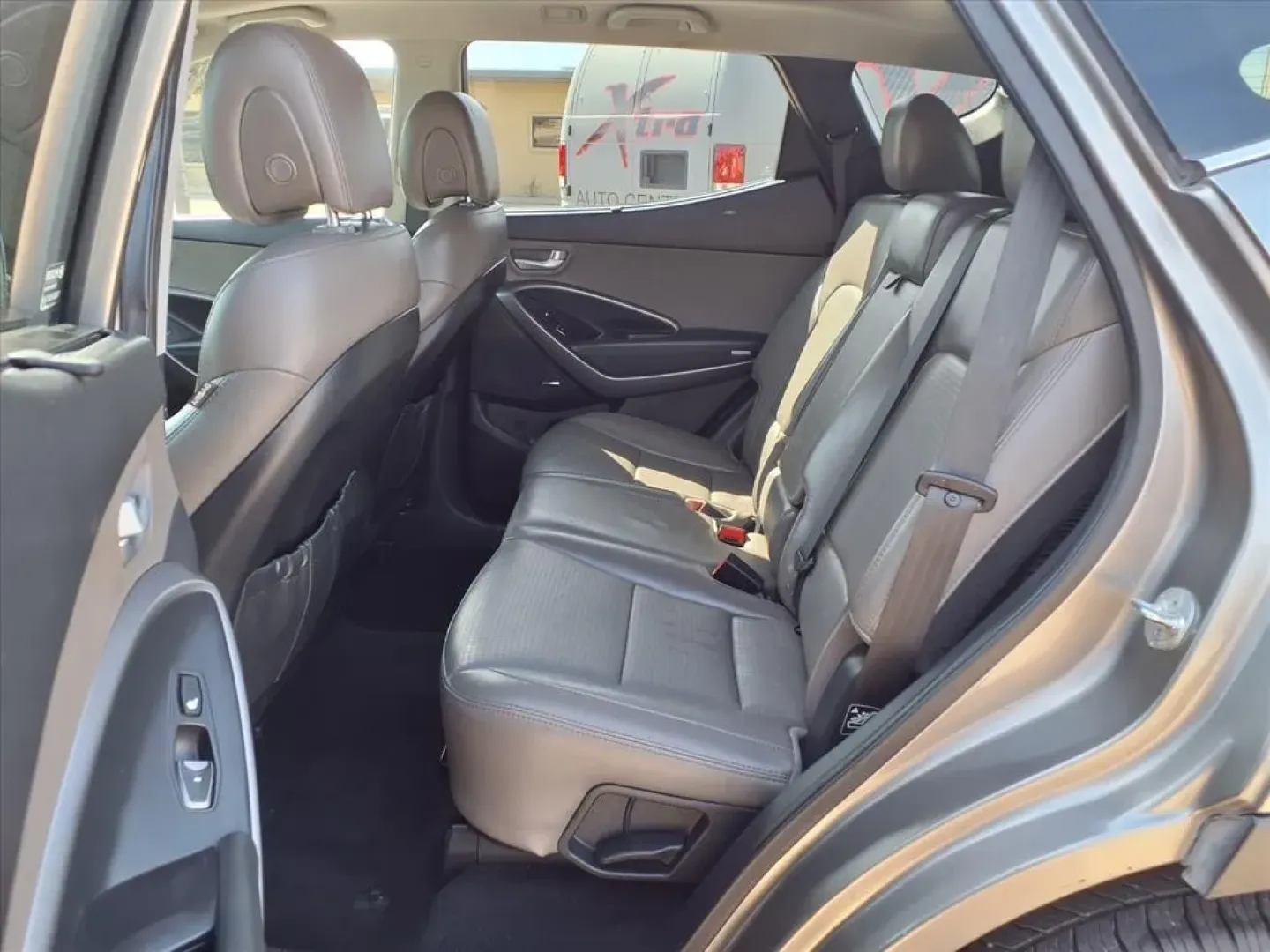 2014 Mineral Gray Hyundai Santa Fe (5XYZU3LB7EG) with an 2.4L engine, Automatic transmission, located at 1401 N. Hobart, Pampa, TX, 79065, (806) 665-9872, 35.549953, -100.975098 - ### Discover Your Perfect Family SUV: 2014 Hyundai Santa Fe Sport at Xtra Auto Center in Pampa, TX!<br /> <br /> Are you on the hunt for a reliable family vehicle that's perfect for road trips, daily commutes, and weekend adventures? Look no further than this 2014 Hyundai Santa Fe Sport, available n - Photo#14