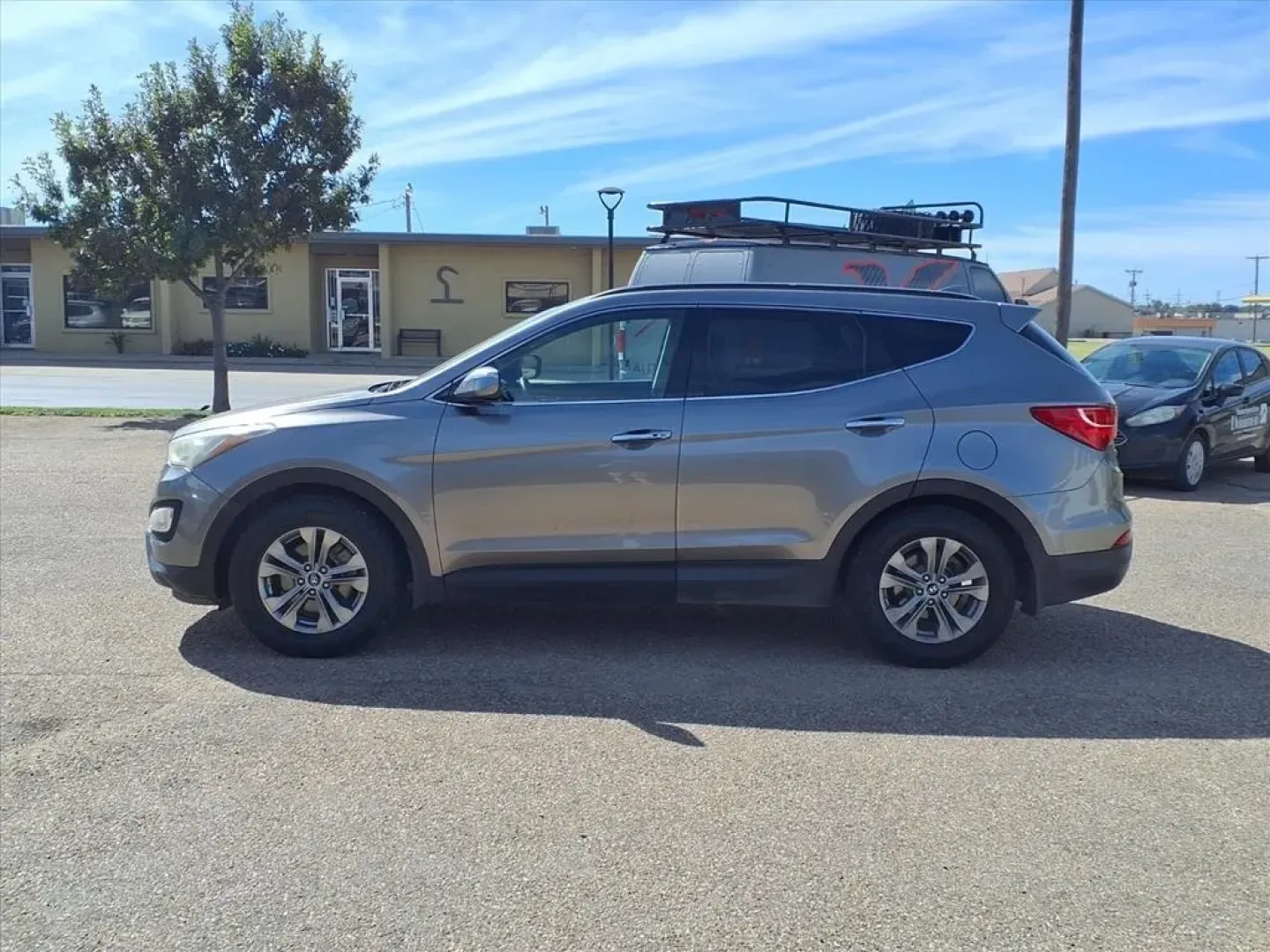 2014 Mineral Gray Hyundai Santa Fe Sport 2.4 FWD (5XYZU3LB7EG) with an Other engine, located at 1401 N. Hobart, Pampa, TX, 79065, (806) 665-9872, 35.549953, -100.975098 - ### Discover Your Perfect Family SUV: 2014 Hyundai Santa Fe Sport at Xtra Auto Center in Pampa, TX!<br /> <br /> Are you on the hunt for a reliable family vehicle that's perfect for road trips, daily commutes, and weekend adventures? Look no further than this 2014 Hyundai Santa Fe Sport, available n - Photo#4