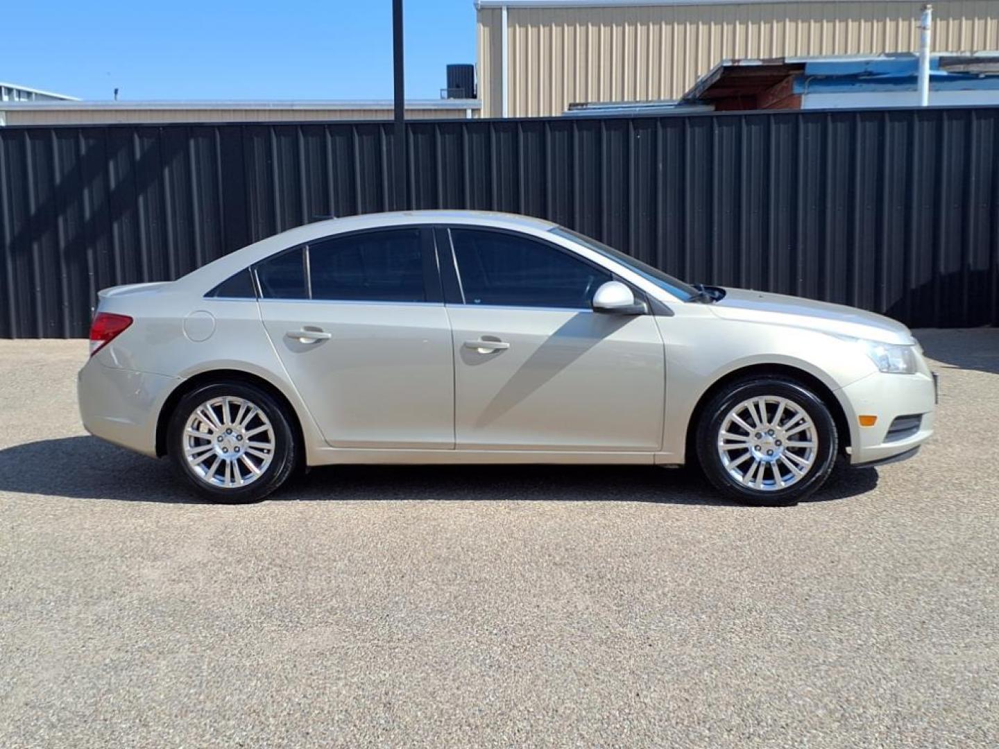 2011 Gold Mist Metallic Chevrolet Cruze ECO (1G1PJ5S92B7) with an 1.4L Ecotec 1.4L Turbo I4 138hp 148ft. lbs. Sequential Multiport Fuel Injection engine, 6-Speed Shiftable Automatic transmission, located at 1401 N. Hobart, Pampa, TX, 79065, (806) 665-9872, 35.549953, -100.975098 - Photo#2
