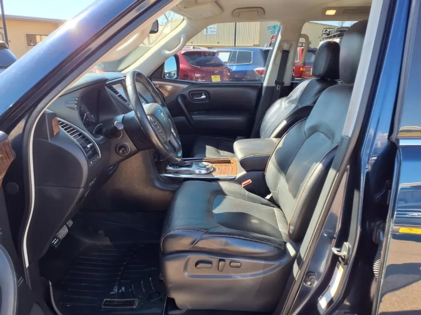 2019 Hermosa Blue Pearl Bw5 Nissan Armada SV (JN8AY2ND6K9) with an 5.6L engine, Automatic transmission, located at 1401 N. Hobart, Pampa, TX, 79065, (806) 665-9872, 35.549953, -100.975098 - Need a road-trip-ready SUV that can handle Texas highways, school drop-offs, and weekend getaways without feeling cramped? This 2019 Nissan Armada SV is built for real life-big family space, strong V8 power, and the confidence of a full-size SUV that's just as comfortable cruising through Pampa as i - Photo#12