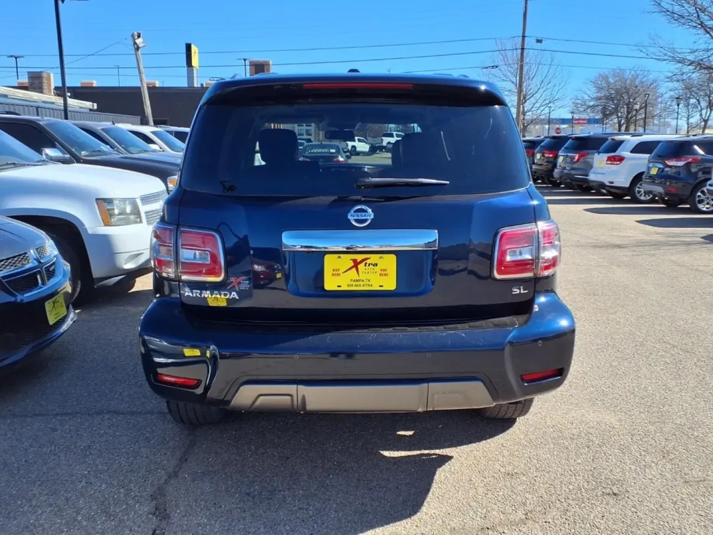 2019 Hermosa Blue Pearl Bw5 Nissan Armada SV (JN8AY2ND6K9) with an 5.6L engine, Automatic transmission, located at 1401 N. Hobart, Pampa, TX, 79065, (806) 665-9872, 35.549953, -100.975098 - Need a road-trip-ready SUV that can handle Texas highways, school drop-offs, and weekend getaways without feeling cramped? This 2019 Nissan Armada SV is built for real life-big family space, strong V8 power, and the confidence of a full-size SUV that's just as comfortable cruising through Pampa as i - Photo#3