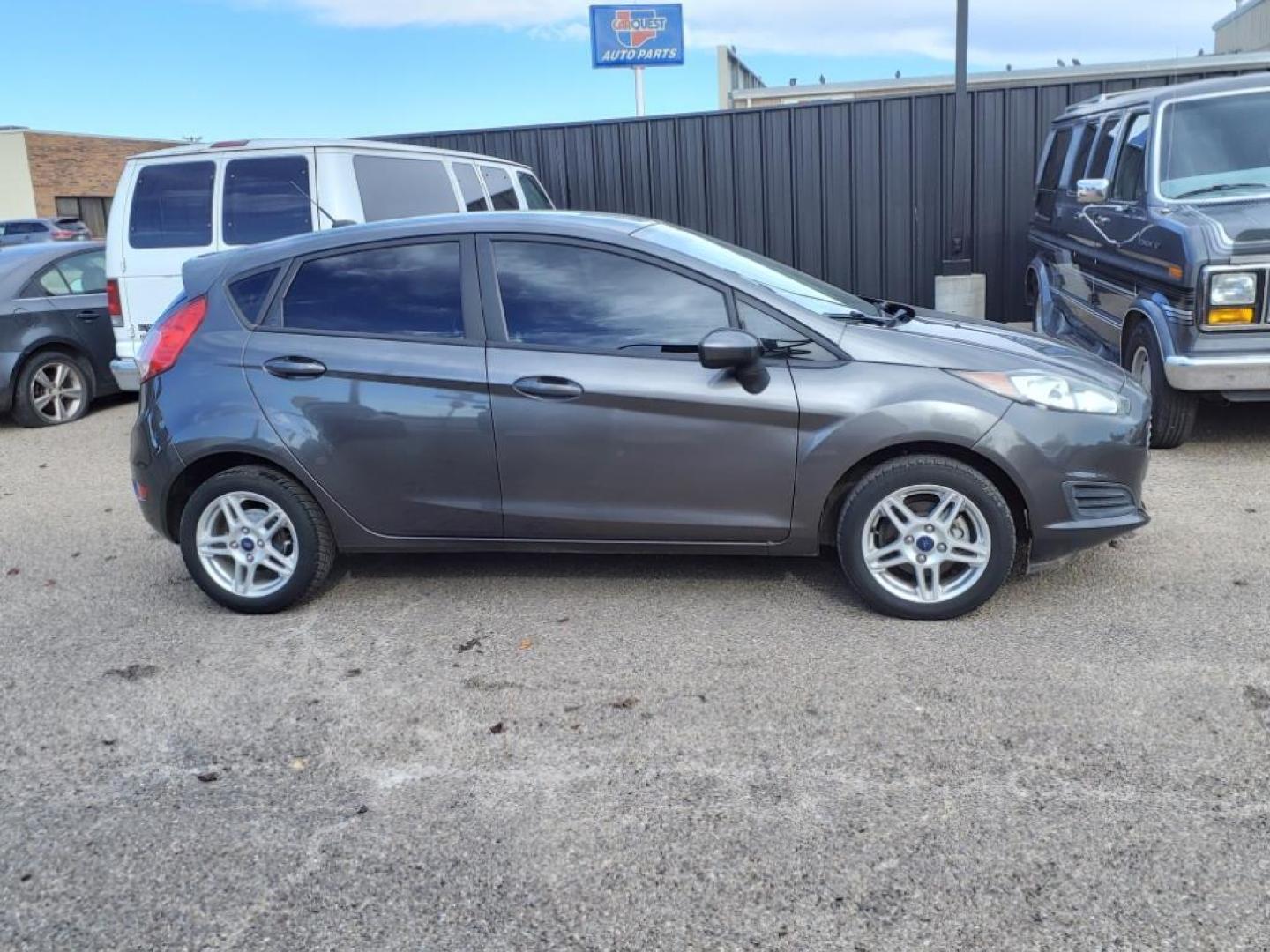 2019 Magnetic J7 Ford Fiesta SE (3FADP4EJ1KM) with an 1.6L 1.6L I4 120hp 112ft. lbs. Sequential Multiport Fuel Injection engine, 6-Speed Double Clutch transmission, located at 1401 N. Hobart, Pampa, TX, 79065, (806) 665-9872, 35.549953, -100.975098 - Photo#2
