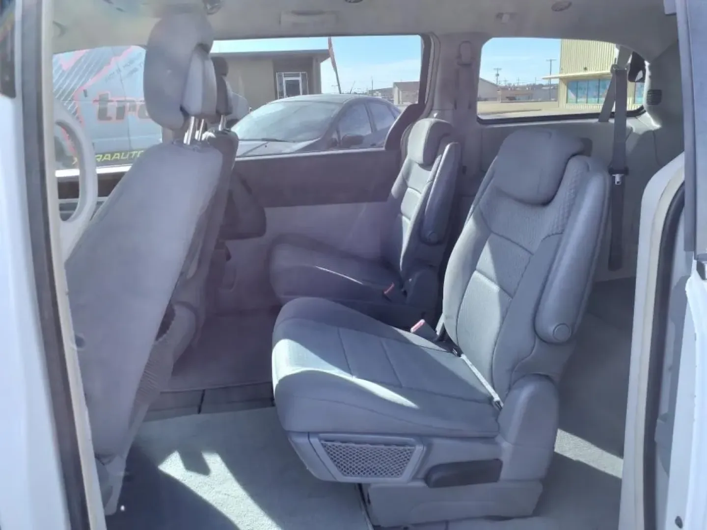 2010 Stone White Clear Coat Pw1 Chrysler Town and Country Touring (2A4RR5D1XAR) with an Other engine, Automatic transmission, located at 1401 N. Hobart, Pampa, TX, 79065, (806) 665-9872, 35.549953, -100.975098 - Are you ready to elevate your family adventures with a spacious and dependable vehicle? The 2010 Chrysler Town and Country Touring van is here to meet your needs, whether it's for school runs, weekend getaways, or family road trips. With its generous passenger capacity and thoughtful features, thi - Photo#11