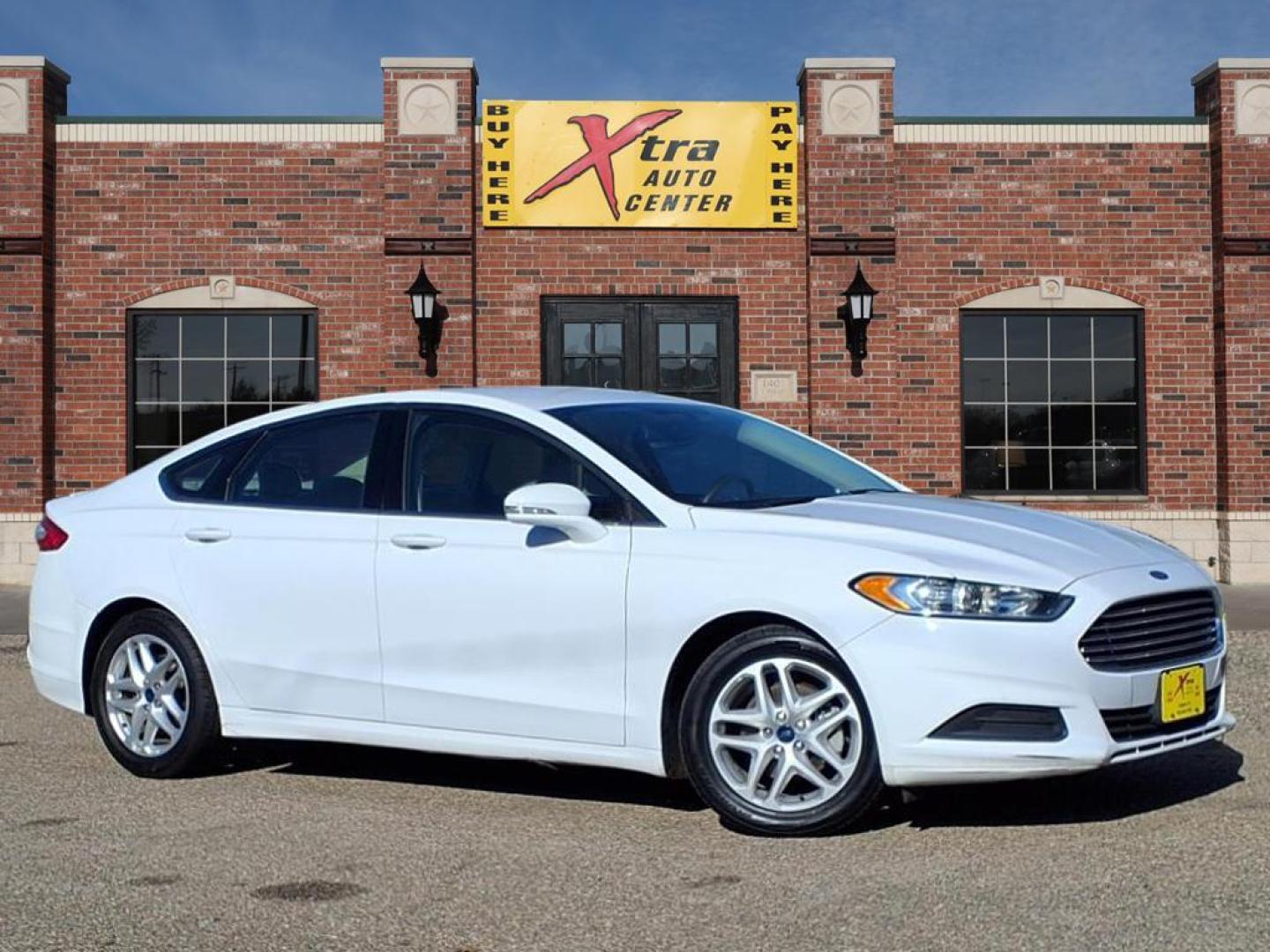 2016 Oxford White Ford Fusion SE (3FA6P0H73GR) with an 2.5L 2.5L I4 175hp 175ft. lbs. Sequential Multiport Fuel Injection engine, 6-Speed Shiftable Automatic transmission, located at 1401 N. Hobart, Pampa, TX, 79065, (806) 665-9872, 35.549953, -100.975098 - Photo#0