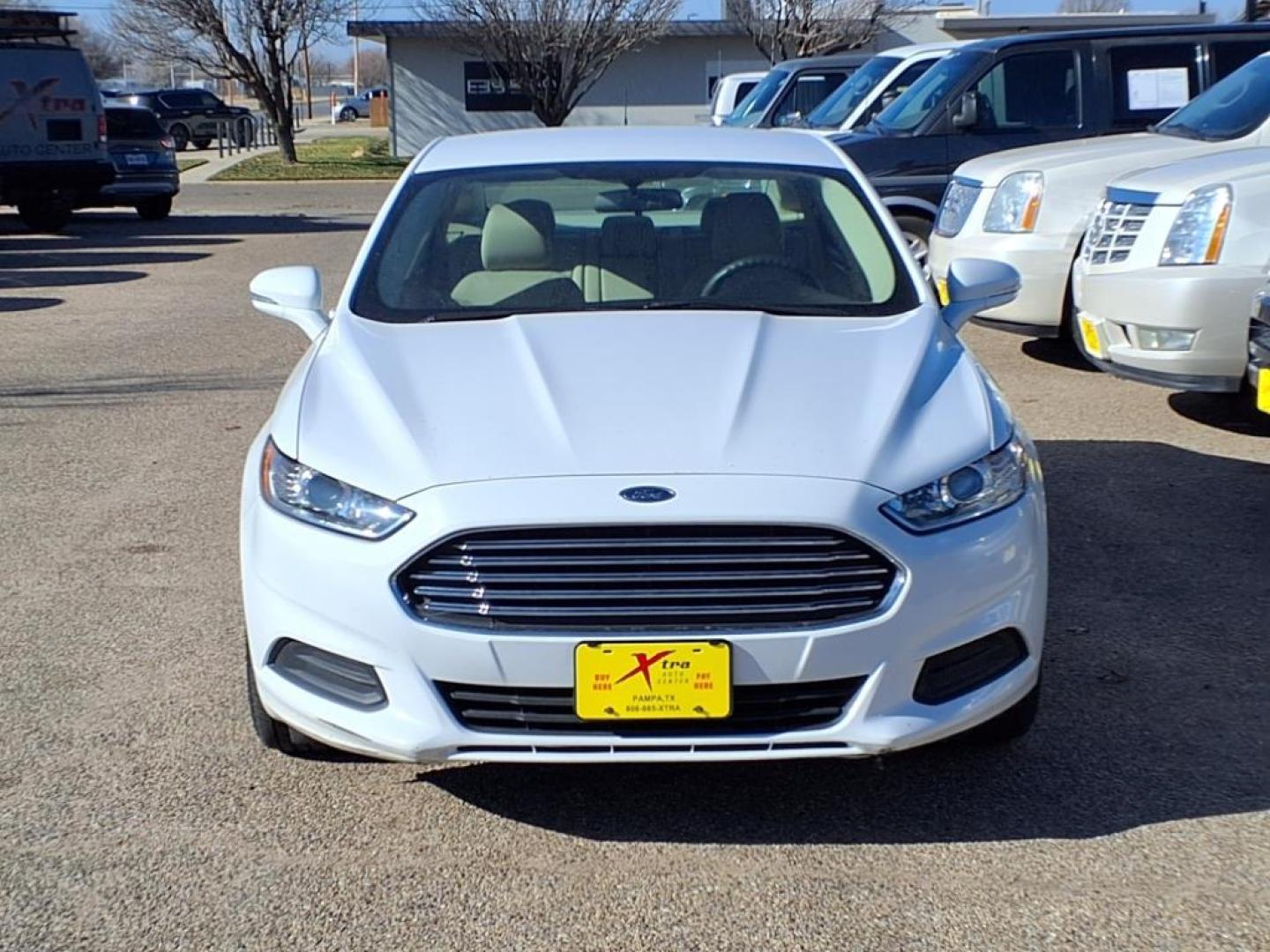 2016 Oxford White Ford Fusion SE (3FA6P0H73GR) with an 2.5L 2.5L I4 175hp 175ft. lbs. Sequential Multiport Fuel Injection engine, 6-Speed Shiftable Automatic transmission, located at 1401 N. Hobart, Pampa, TX, 79065, (806) 665-9872, 35.549953, -100.975098 - Photo#1
