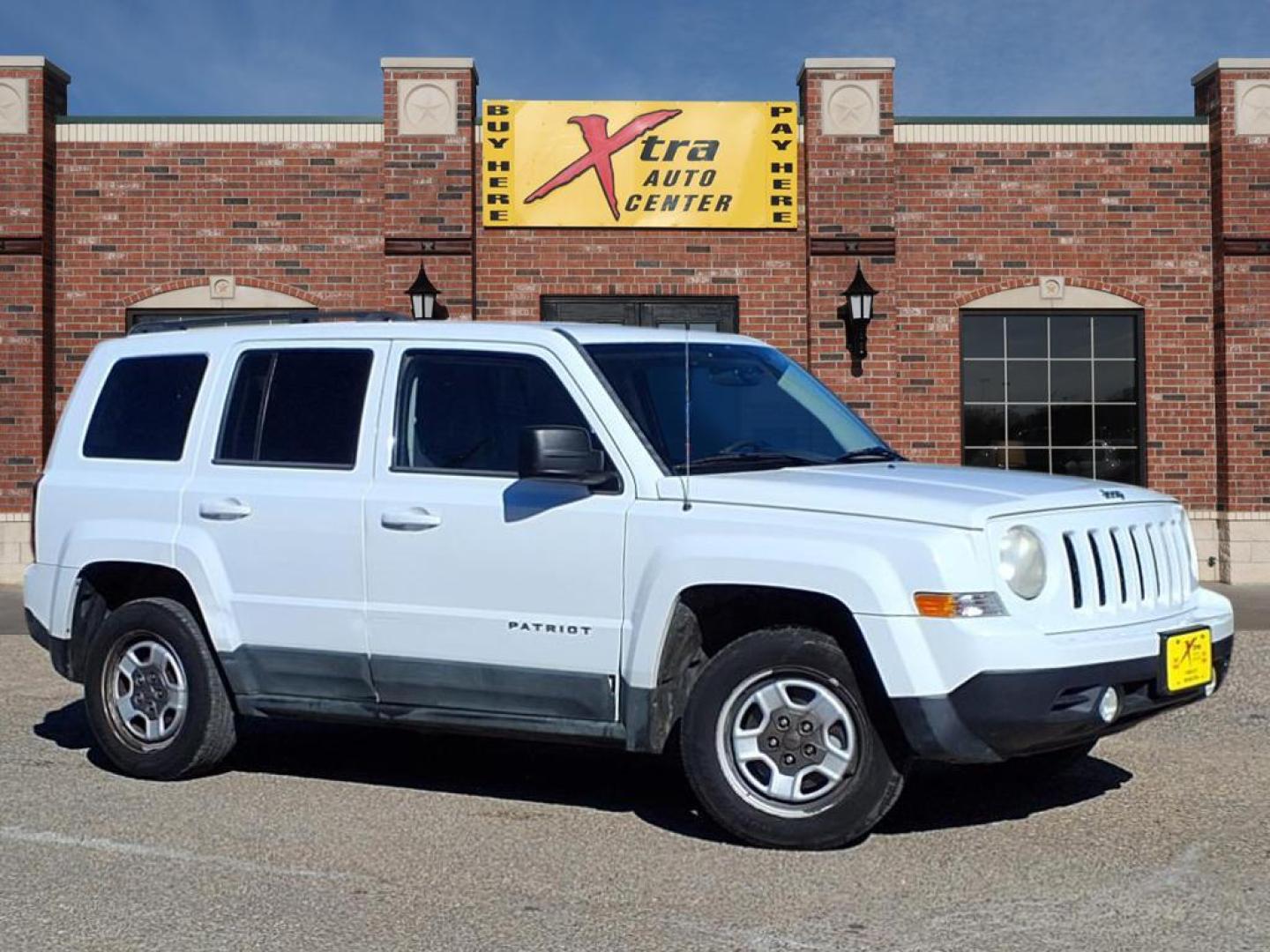 2011 Bright White Clear Coat Pw7 Jeep Patriot Sport (1J4NT1GB9BD) with an 2.4L 2.4L I4 172hp 165ft. lbs. Sequential Multiport Fuel Injection engine, CVT transmission, located at 1401 N. Hobart, Pampa, TX, 79065, (806) 665-9872, 35.549953, -100.975098 - Photo#0