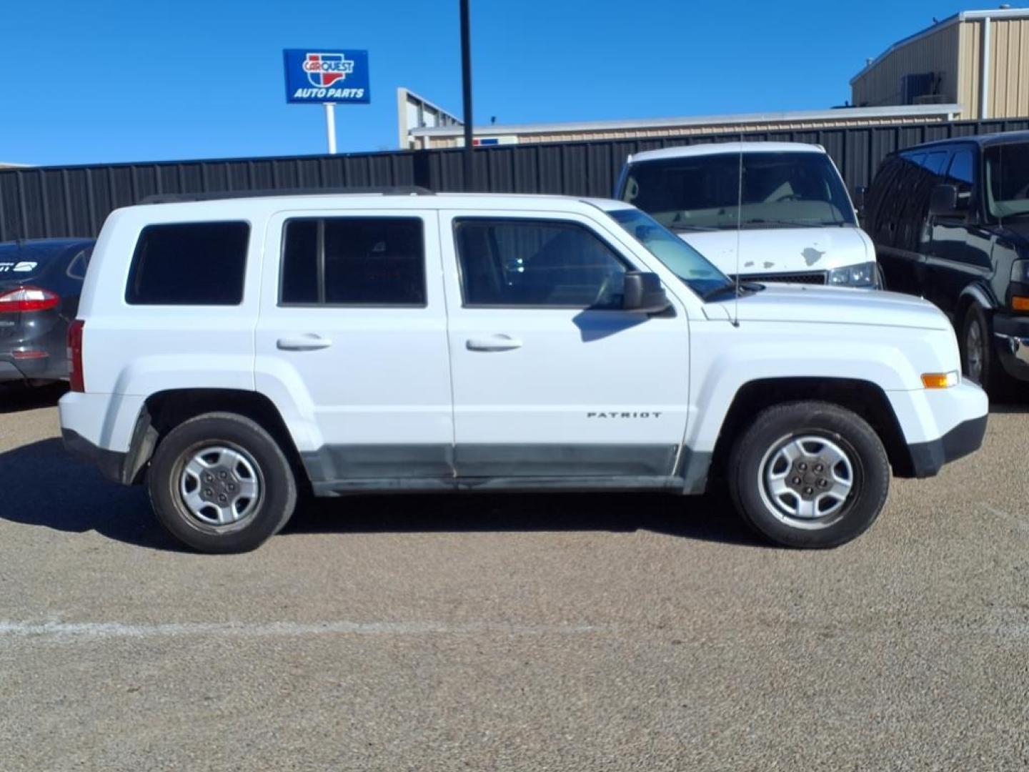 2011 Bright White Clear Coat Pw7 Jeep Patriot Sport (1J4NT1GB9BD) with an 2.4L 2.4L I4 172hp 165ft. lbs. Sequential Multiport Fuel Injection engine, CVT transmission, located at 1401 N. Hobart, Pampa, TX, 79065, (806) 665-9872, 35.549953, -100.975098 - Photo#2