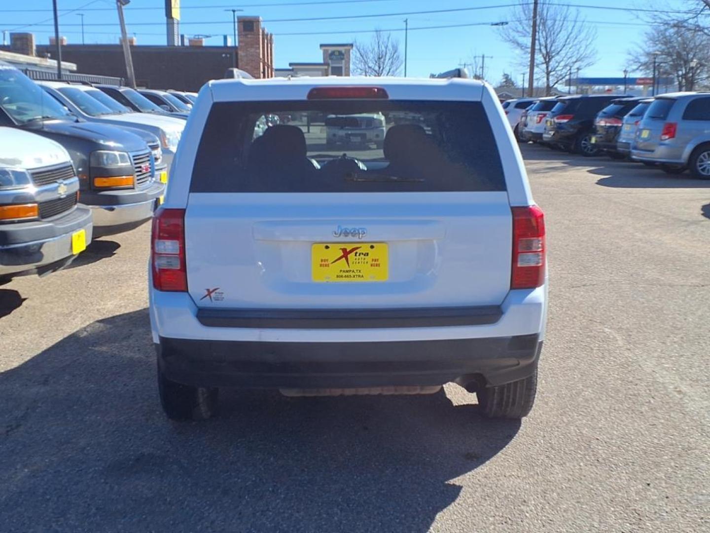 2011 Bright White Clear Coat Pw7 Jeep Patriot Sport (1J4NT1GB9BD) with an 2.4L 2.4L I4 172hp 165ft. lbs. Sequential Multiport Fuel Injection engine, CVT transmission, located at 1401 N. Hobart, Pampa, TX, 79065, (806) 665-9872, 35.549953, -100.975098 - Photo#3
