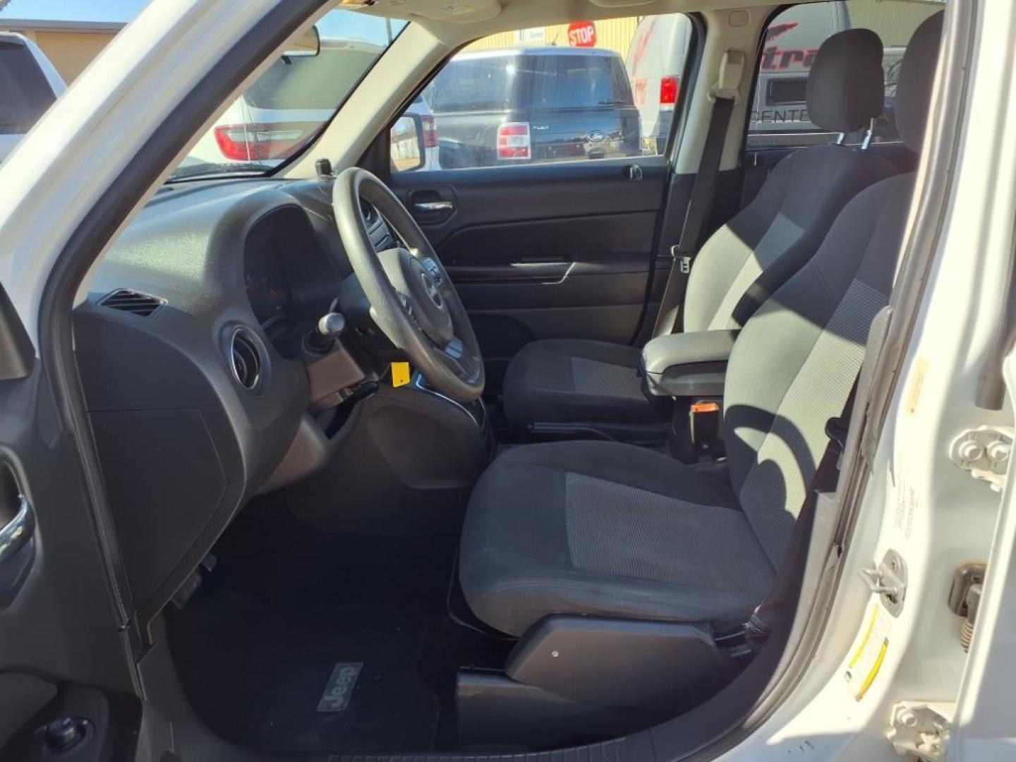 2011 Bright White Clear Coat Pw7 Jeep Patriot Sport (1J4NT1GB9BD) with an 2.4L 2.4L I4 172hp 165ft. lbs. Sequential Multiport Fuel Injection engine, CVT transmission, located at 1401 N. Hobart, Pampa, TX, 79065, (806) 665-9872, 35.549953, -100.975098 - Photo#10