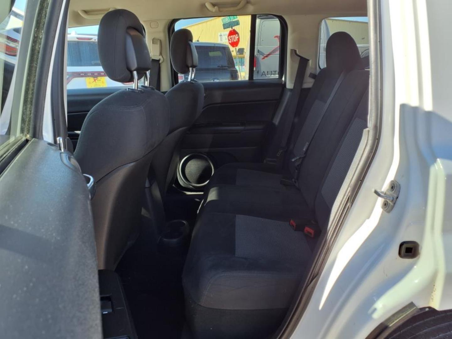 2011 Bright White Clear Coat Pw7 Jeep Patriot Sport (1J4NT1GB9BD) with an 2.4L 2.4L I4 172hp 165ft. lbs. Sequential Multiport Fuel Injection engine, CVT transmission, located at 1401 N. Hobart, Pampa, TX, 79065, (806) 665-9872, 35.549953, -100.975098 - Photo#11