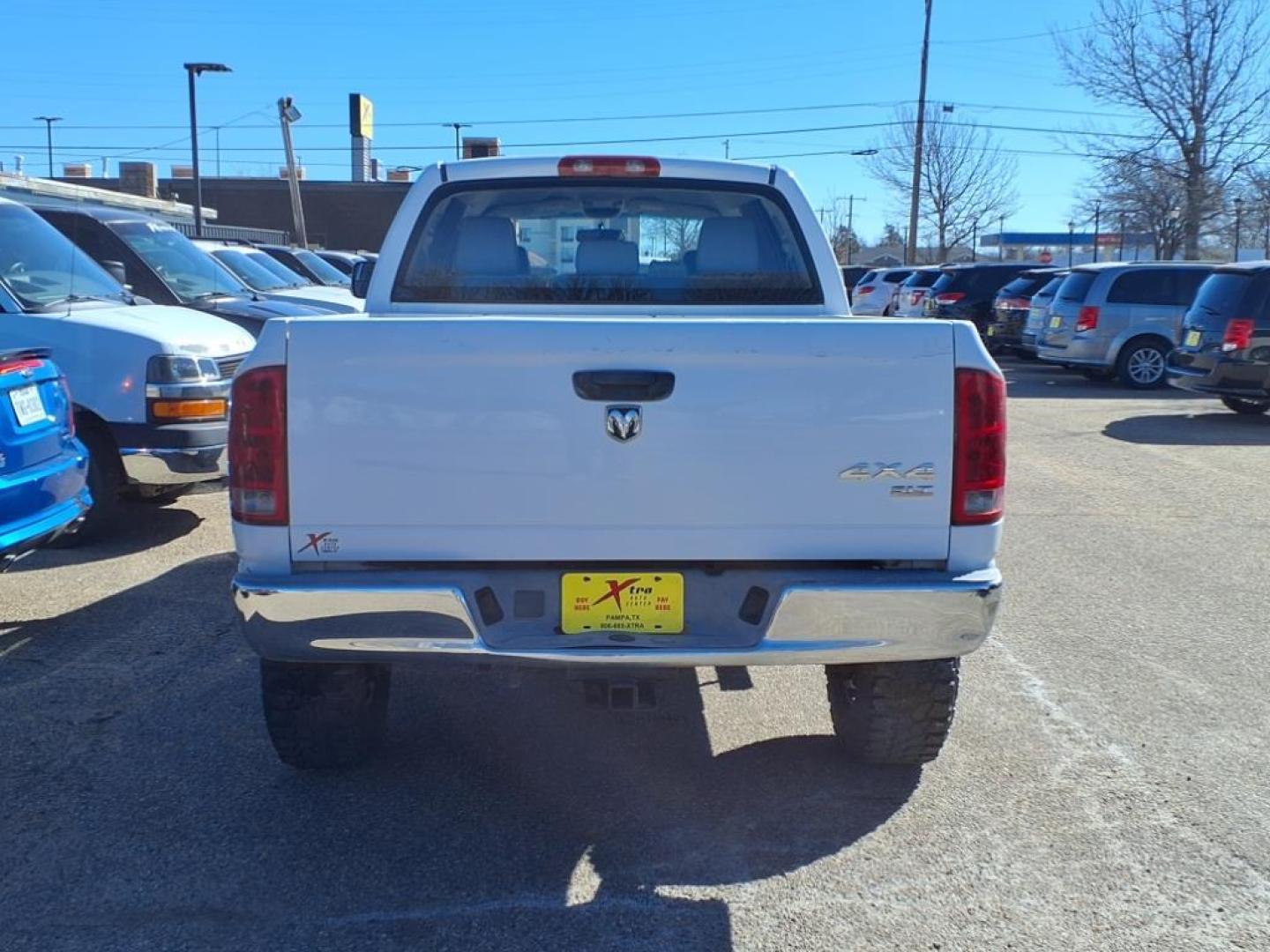 2006 Bright White Clearcoat Pw7 Dodge Ram 1500 SLT (3D7KS19D96G) with an 5.7L HEMI 5.7L V8 345hp 375ft. lbs. Sequential Multiport Fuel Injection engine, 5-Speed Automatic transmission, located at 1401 N. Hobart, Pampa, TX, 79065, (806) 665-9872, 35.549953, -100.975098 - Photo#3