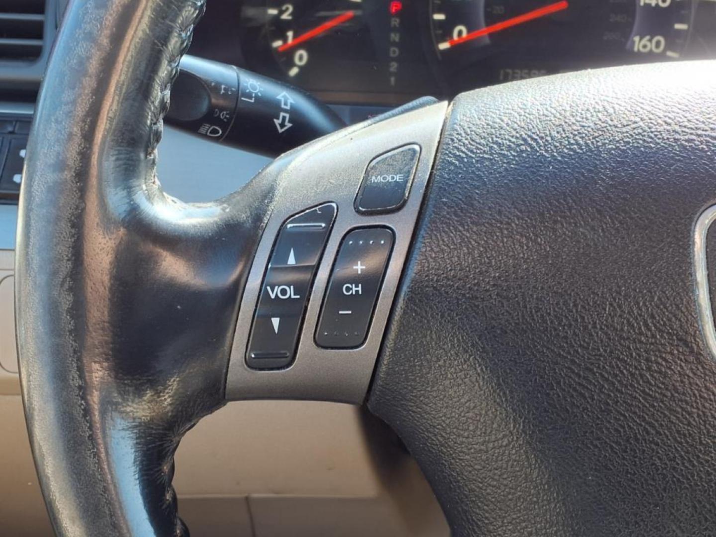 2006 Redrock Pearl Re Honda Odyssey EX-L w/DVD (5FNRL38706B) with an 3.5L 3L NA V6 single overhead cam (SOHC) 24V Fuel Injected engine, 5-Speed Automatic transmission, located at 1401 N. Hobart, Pampa, TX, 79065, (806) 665-9872, 35.549953, -100.975098 - Photo#10