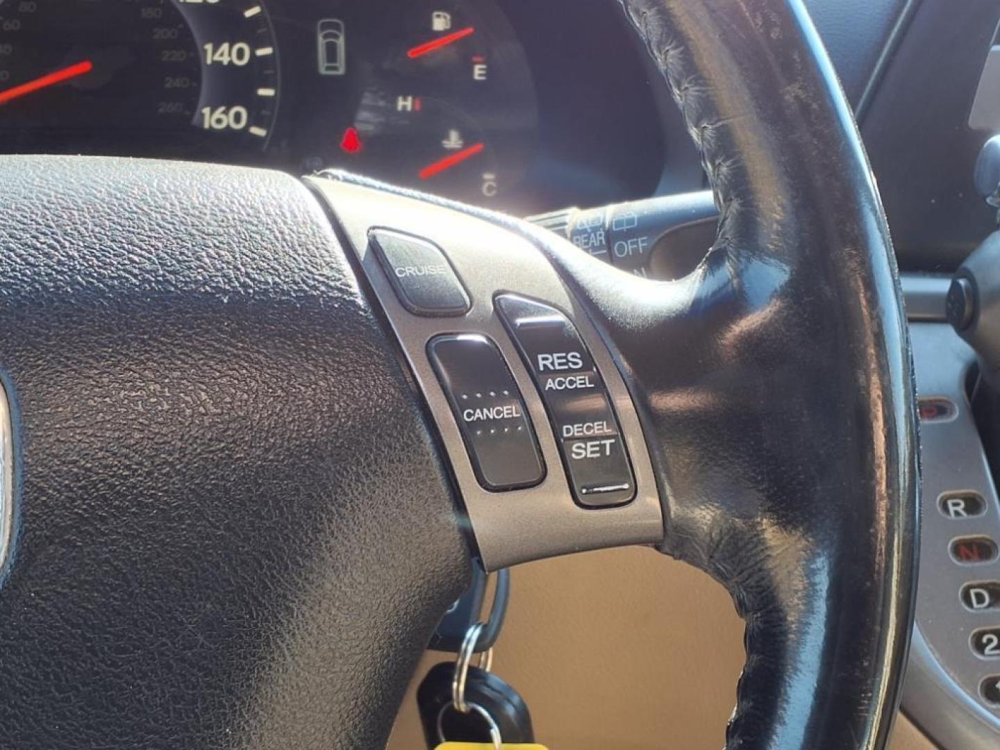 2006 Redrock Pearl Re Honda Odyssey EX-L w/DVD (5FNRL38706B) with an 3.5L 3L NA V6 single overhead cam (SOHC) 24V Fuel Injected engine, 5-Speed Automatic transmission, located at 1401 N. Hobart, Pampa, TX, 79065, (806) 665-9872, 35.549953, -100.975098 - Photo#11