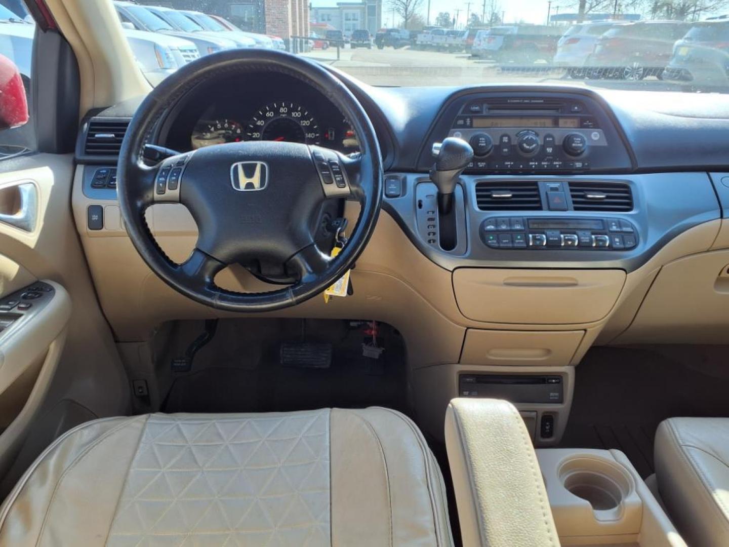 2006 Redrock Pearl Re Honda Odyssey EX-L w/DVD (5FNRL38706B) with an 3.5L 3L NA V6 single overhead cam (SOHC) 24V Fuel Injected engine, 5-Speed Automatic transmission, located at 1401 N. Hobart, Pampa, TX, 79065, (806) 665-9872, 35.549953, -100.975098 - Photo#12