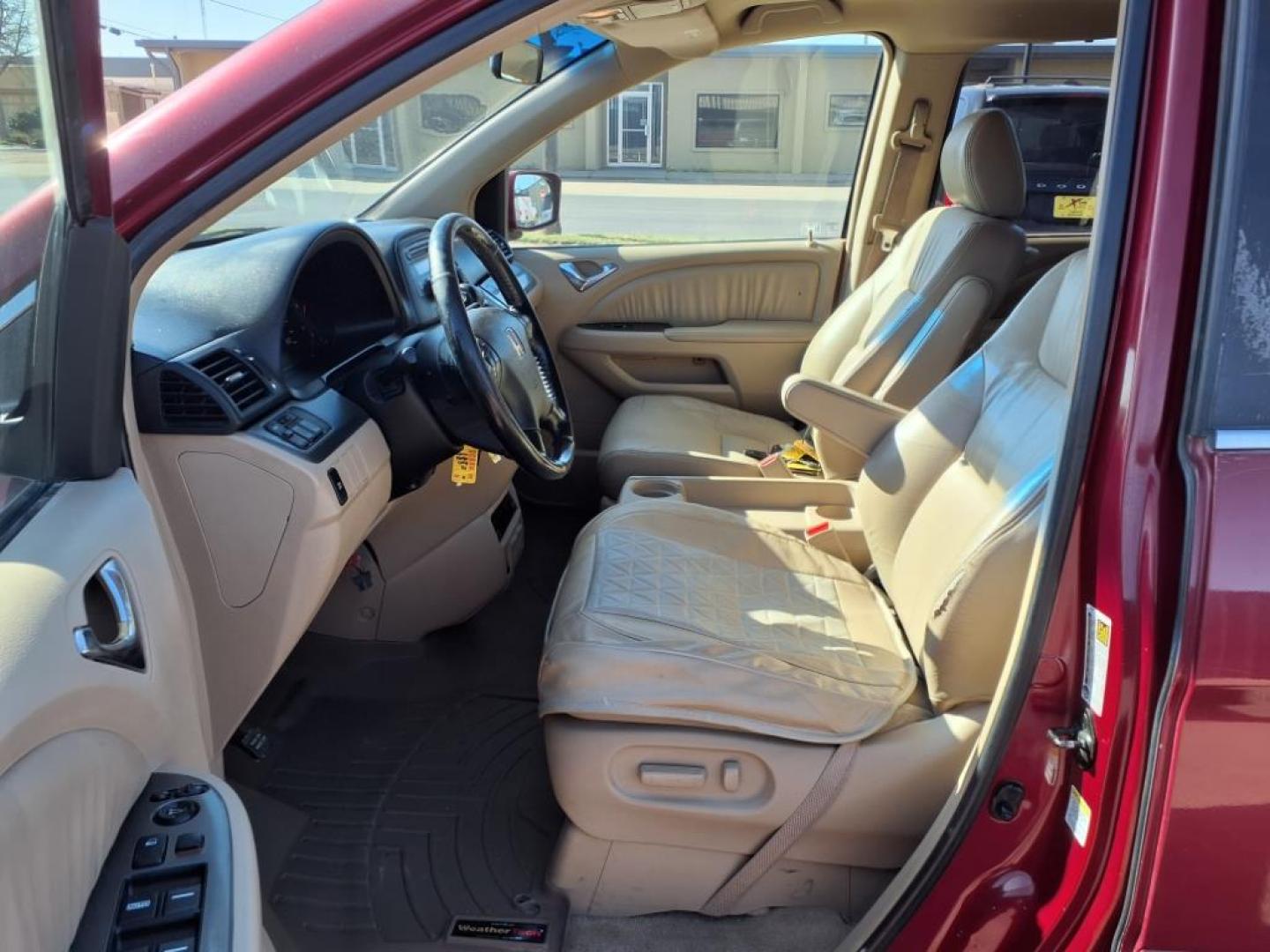 2006 Redrock Pearl Re Honda Odyssey EX-L w/DVD (5FNRL38706B) with an 3.5L 3L NA V6 single overhead cam (SOHC) 24V Fuel Injected engine, 5-Speed Automatic transmission, located at 1401 N. Hobart, Pampa, TX, 79065, (806) 665-9872, 35.549953, -100.975098 - Photo#13
